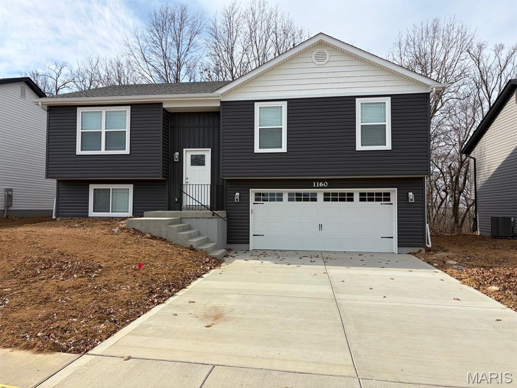 BRAND NEW home with every option you could imagine! They include vaulted ceilings, rounded “bullnose” corners, granite or quartz countertops, stainless steel appliances, 42" cabinets with "cushion close", custom neutral-colored paint job throughout, LVT flooring throughout most of the home, framed windows, taller baseboards, adult-sized cabinets in bathrooms with marble countertops, walk-in closets, upgraded carriage garage doors with openers on 2 CAR Garage, full bath rough-in, panel doors (many varieties), and upgraded water/light fixtures throughout the house! MAIN FLOOR laundry! Fully sodded yard (front/sides/back). *Pictures are of previously built homes. Builder/Broker* This home is USDA eligible.