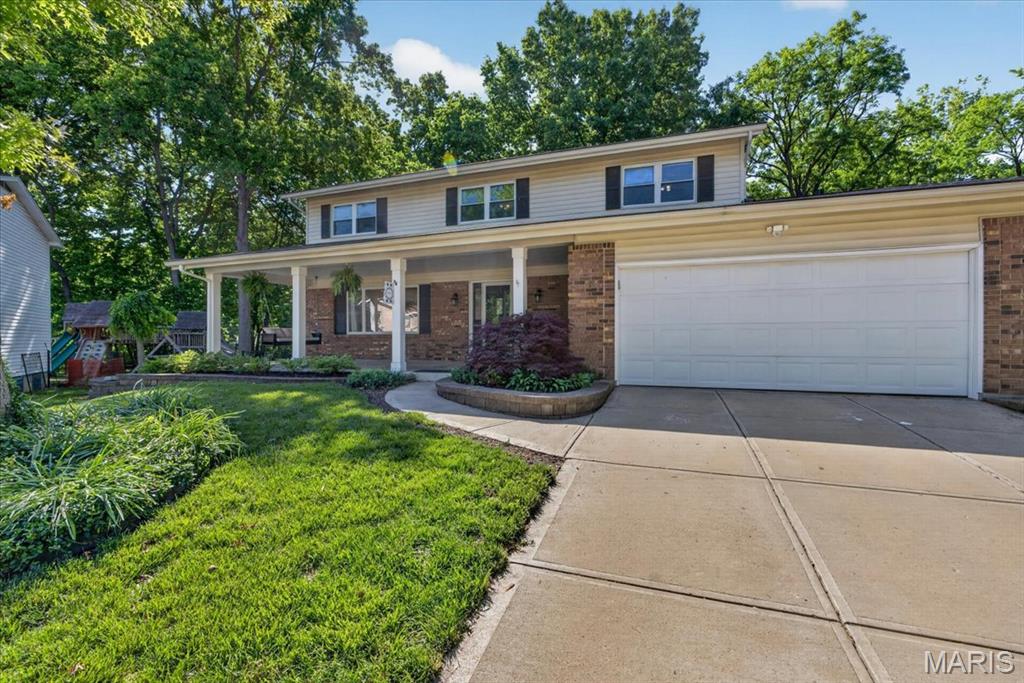 Welcome to 52 Smoke Tree Court, a beautifully maintained traditional 4-bedroom, 3-bathroom home nestled on a quiet cul-de-sac in the highly sought-after Brookwood subdivision. This spacious 2,380-square-foot residence offers the perfect blend of comfort and style, making it an ideal choice for your next chapter. Enjoy the best of Fenton living with easy access to a vibrant array of local shopping and dining options just minutes away.   Top-Tier Education: Located within the prestigious, AAA-rated Rockwood R-VI School District. Spacious Living: The main floor features elegant hardwood flooring throughout the living room, dining room, and great room, which also boasts a cozy fireplace.   Modern Kitchen: The heart of the home includes custom cabinetry, granite countertops, a center island, and high-quality ceramic tile flooring.   Comfortable Bedrooms:  4 bedrooms are situated on the upper level. Outdoor Living: Relax on the charming covered front porch or enjoy the private backyard space.   Room to Grow: The full basement features an 8-foot pour, providing ample storage or the potential for future finished living space.