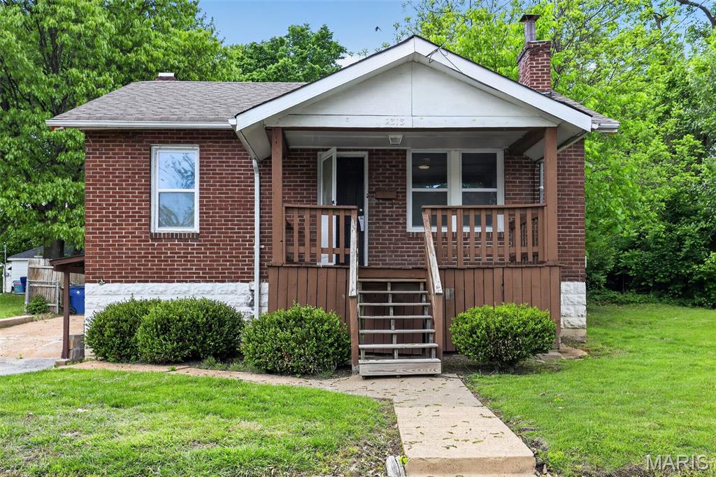 Charming brick bungalow located in a well-established St. Louis neighborhood. This classic single-family home offers timeless curb appeal with a low-pitched gable roof, covered front entry, and traditional brick façade. Inside, the layout reflects early 20th-century craftsmanship with spacious main living areas, hardwood flooring potential, and abundant natural light throughout.

The home features a functional floor plan with comfortable room sizes, a full basement providing additional storage or potential expansion space, and a generous backyard suitable for outdoor enjoyment, gardening, or future improvements. The property sits on a residential street with paved road access, mature surrounding homes, and convenient proximity to local schools, parks, shopping, and major commuter routes.

With strong structural fundamentals and classic architectural character, this home presents an excellent opportunity for both owner-occupants and investors seeking value in a stable neighborhood setting.