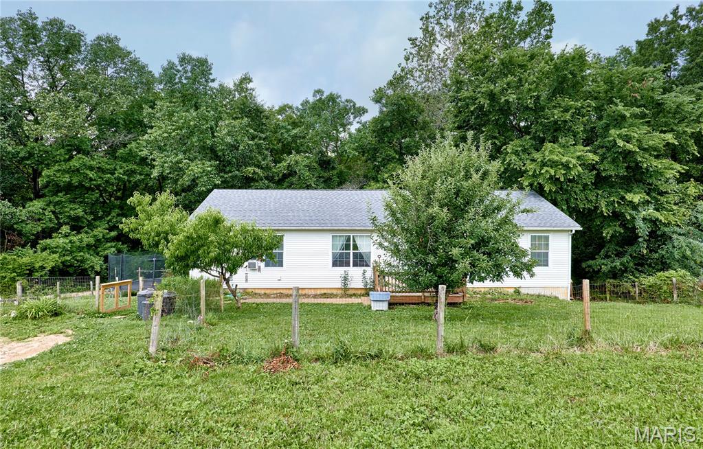 Opportunity awaits in the desirable Winfield School District! This 3-bedroom, 2-bath modular home sits on a walkout foundation and offers plenty of potential for investors, flippers, or buyers looking to build equity. While the home could use some TLC and updating, several major improvements have already been completed, including a new roof and newer water heater. Spacious floor plan, walkout lower level, and a great location make this a property worth considering. Bring your vision and make this home shine again!