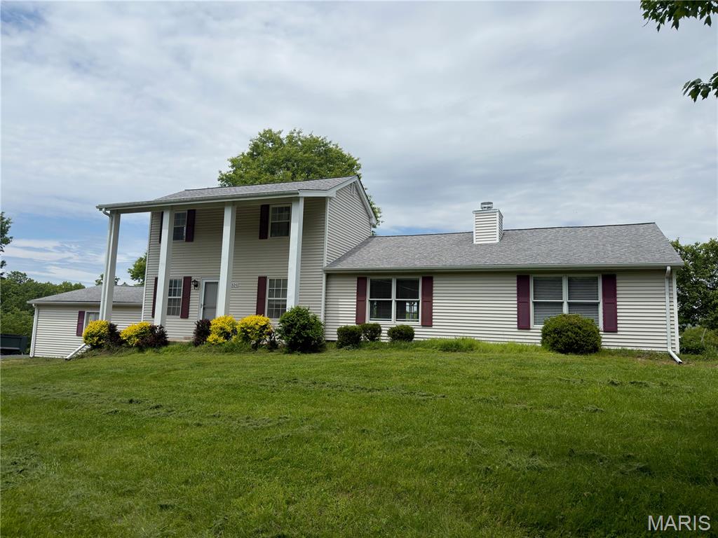 Looking for peaceful country living with room for all your toys, tools, and equipment—while still being just minutes from Wildwood? This beautifully remodeled farmhouse on 3.13 acres offers the perfect blend of modern updates and timeless country charm. Featuring 3 bedrooms, 3 full baths, and two spacious master suites, this home boasts an open floor plan, a 2-car attached garage, and character throughout while maintaining its original farmhouse appeal.

Need storage, workshop space, or room for a car collection? This property truly delivers with two incredible outbuildings—one massive barn with space for approximately 10 vehicles, plus a second outbuilding that can accommodate approximately 8 vehicles. Perfect for contractors, hobbyists, mechanics, collectors, or anyone needing extra space for tools, equipment, boats, ATVs, or recreational vehicles.

The interior has been beautifully updated and is move-in ready, while the exterior simply awaits your finishing touches. If you’ve been dreaming of country living with acreage, charm, and unmatched storage—this is a rare opportunity!

Property is being sold "as is"