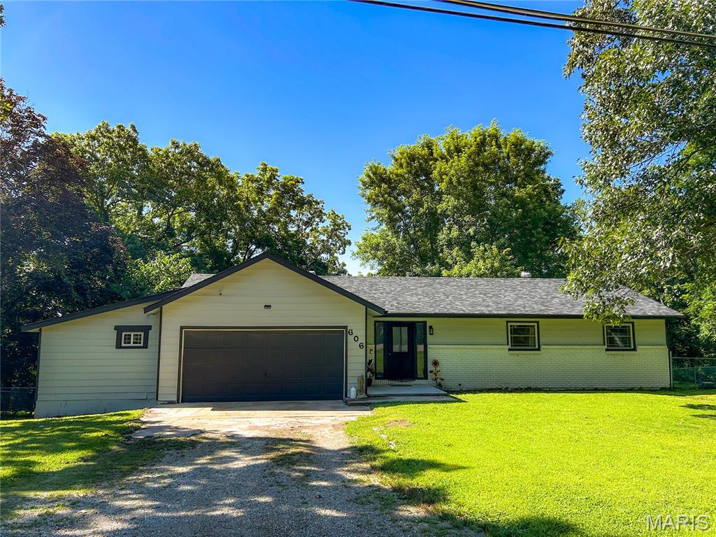 MUST SEE - Tucked away on a quiet cul-de-sac in Waynesville and just a short drive to Fort Leonard Wood, this spacious 5 bedroom, 3 bathroom home offers the perfect blend of comfort and convenience! With over 2,400 sq ft of living space, this home features an open-concept layout connecting the living room, dining area, and kitchen—ideal for everyday living and entertaining. The kitchen boasts stainless steel appliances, a huge pantry, and plenty of workspace, while the dining area features a cozy electric fireplace. The main level offers 3 bedrooms and 2 full bathrooms, while the full finished walkout basement includes 2 additional bedrooms, a full bath, large family room, and laundry area. Enjoy outdoor living in the fenced backyard, plus the convenience of a 2-car attached garage and reverse osmosis system already installed. Move-in ready with room for everyone! Schedule your private tour of this beautiful home soon!