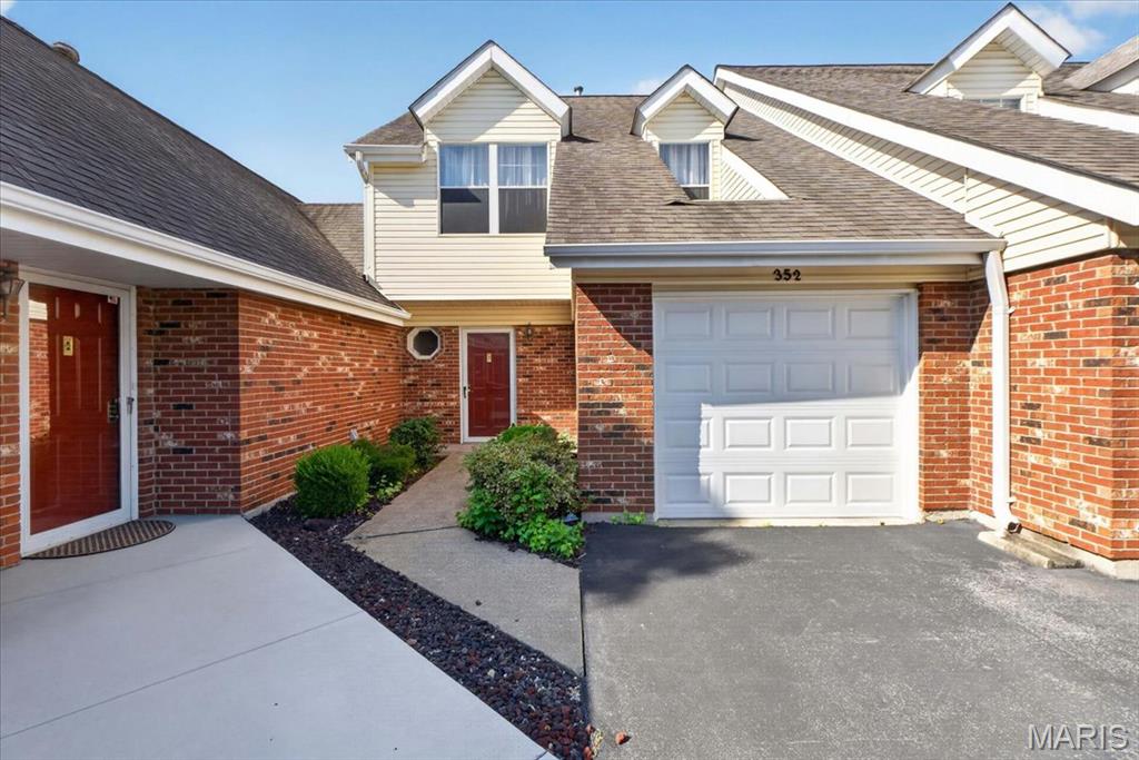 ***OPEN HOUSE SUNDAY, 7/26 FROM 12:30 TO 2:00PM!***

Welcome to easy, low-maintenance living in the heart of St. Peters! This charming 2-bedroom, 2.5-bath townhome offers soaring ceilings, functional living spaces, and an unbeatable location close to shopping, restaurants, parks, and major highways. Residents also enjoy access to the community pool, making it easy to cool off all summer without the maintenance!

Inside, the dramatic two-story living room features a skylight and cozy fireplace, creating a bright, open space that flows seamlessly into the dining area and kitchen. The kitchen is equipped with a gas range, built-in microwave, stainless steel refrigerator, and direct access to the attached one-car garage for everyday convenience. Sliding glass doors open to a private patio, providing the perfect spot to grill, unwind, or enjoy your morning coffee.

The main level also includes a convenient half bath, stackable washer and dryer, and additional storage beneath the staircase. Upstairs, the spacious primary suite spans nearly the entire front of the home and includes its own full bath. The second bedroom and adjacent full bathroom are perfect for family, guests, or a dedicated home office.

In addition to the attached garage, the home includes an assigned parking space. The HOA covers landscaping, exterior maintenance, water, trash, and community pool access, allowing you to spend more time enjoying your home and less time maintaining it! Located in the desirable Fort Zumwalt School District, this move-in-ready townhome is an excellent opportunity for first-time buyers, downsizers, or anyone looking for affordable, carefree living in St. Peters. Schedule a showing today!