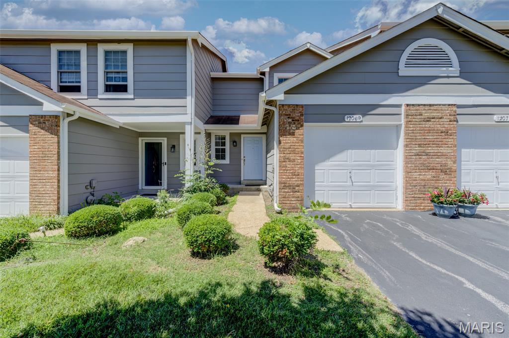 Welcome home to this spacious 2-bedroom, 2-bath townhouse with an attached private garage, ideally situated amid expansive green space that creates a peaceful and inviting setting. Offering approximately 1,200 square feet of above-grade living space, the home features a comfortable open floor plan with a combined living and dining area that walks out to a wood deck overlooking a lovely, tranquil view—perfect for morning coffee or unwinding at the end of the day. Natural light fills the interior, enhancing the bright, welcoming atmosphere. Neutral decor, energy-efficient thermal windows, generous closet space, upgraded carpeting (2025), and practical updates throughout add to the home's appeal. While some future improvements may allow a new owner to build additional equity, the property already offers excellent value with updates that include newer toilets, dishwasher, lighting, vertical blinds, washer and dryer, water heater (2022), air conditioner (2019), furnace (2016), and garage door opener. The primary suite features a triple closet with an organization system and convenient access to a Jack-and-Jill bath. Walk-in closet in nicely sized secondary bedroom. The walk-out basement remains unfinished, providing abundant storage and excellent potential for future customization. Convenient access is available through either the front entrance or attached garage. The location offers easy access to major highways, shopping, dining, the Airport, community amenities, and 2,145 acre Creve Coeur Lake. Residents enjoy a well-maintained community featuring a swimming pool, clubhouse, tennis courts, scenic lakes, and expansive common grounds. Combining space, value, updates, and future potential, this townhouse presents an attractive opportunity for buyers seeking comfort, convenience, and room to make a home their own.