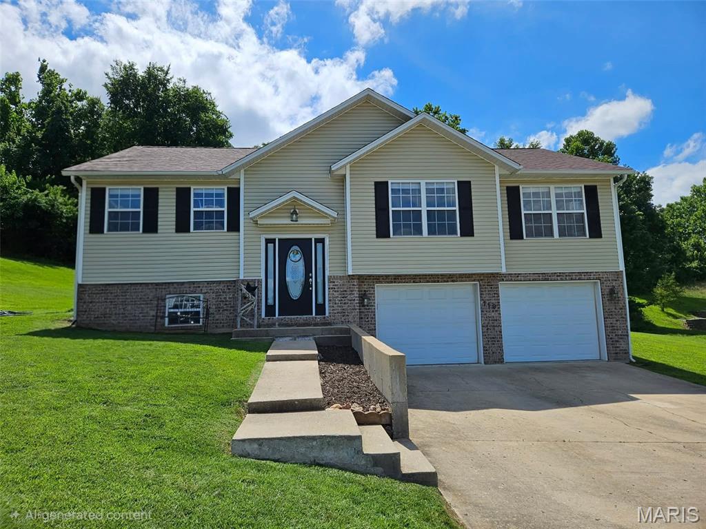 Located in a highly desirable neighborhood just minutes from Fort Leonard Wood, shopping, schools, and dining, this spacious 4-bedroom, 3-bath split-level home offers comfort, functionality, and an inviting layout. Large windows and vaulted ceilings create a bright, open atmosphere throughout the main living areas. Beautiful solid-surface flooring enhances the living space, while tile flooring in the wet areas and carpeted bedrooms provide both style and comfort.

The kitchen features soft white cabinetry, a full pantry, and ample storage to keep everything organized. The primary suite serves as a relaxing retreat with dual vanities, a separate soaking tub and shower, and a walk-in closet. The lower level offers a cozy family room, an additional bedroom, and a private full bath—perfect for guests, extended family, or a home office setup.

An oversized 2-car garage provides plenty of room for vehicles, storage, and hobbies. Combining a fantastic location with a well-designed floor plan, this home is ready to welcome its next owner.