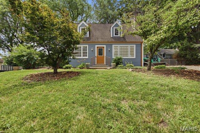 Welcome home to this charming 3-bedroom, 2-full-bath home situated on just over a half-acre lot! This inviting 1.5-story home features a spacious main-level primary bedroom, a cozy living room with a wood-burning fireplace, and a separate dining room perfect for family meals or entertaining. 

Upstairs, you'll find two generously sized bedrooms, a full bath, and abundant storage space. Walk-out basement leads to the outside, where the expansive lot offers endless possibilities for relaxing, gardening, outdoor activities, or hosting family and friends. Additional highlights include newer copper gutters, a patio, and a large shed with an extra patio area.

Move-in ready and full of potential, this home combines comfort, space, and convenience. Don't miss your opportunity to make it your own!