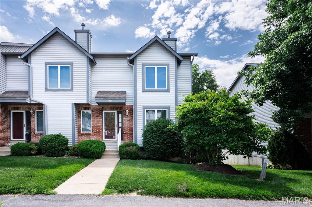 Welcome to 4207 Sherman Park Drive, in desirable Sherman Meadows! Fabulous end unit townhome featuring 2 great size Bedrooms & 2.5 Baths in the heart of St. Charles, quick to amenities, shopping, dining & highways! Neighborhood amenities include community pool, tennis and clubhouse. Thoughtfully designed floor plan for easy living with spacious living room, wet bar, powder room, main floor laundry, inviting kitchen & breakfast room opening to a private deck perfect for relaxing. Upstairs features a lovely primary bedroom and bath and a secondary bedroom & hall full bath. Enjoy the convenience of a 2-car attached garage and storage area. Washer, Dryer & Kitchen Refrig included.