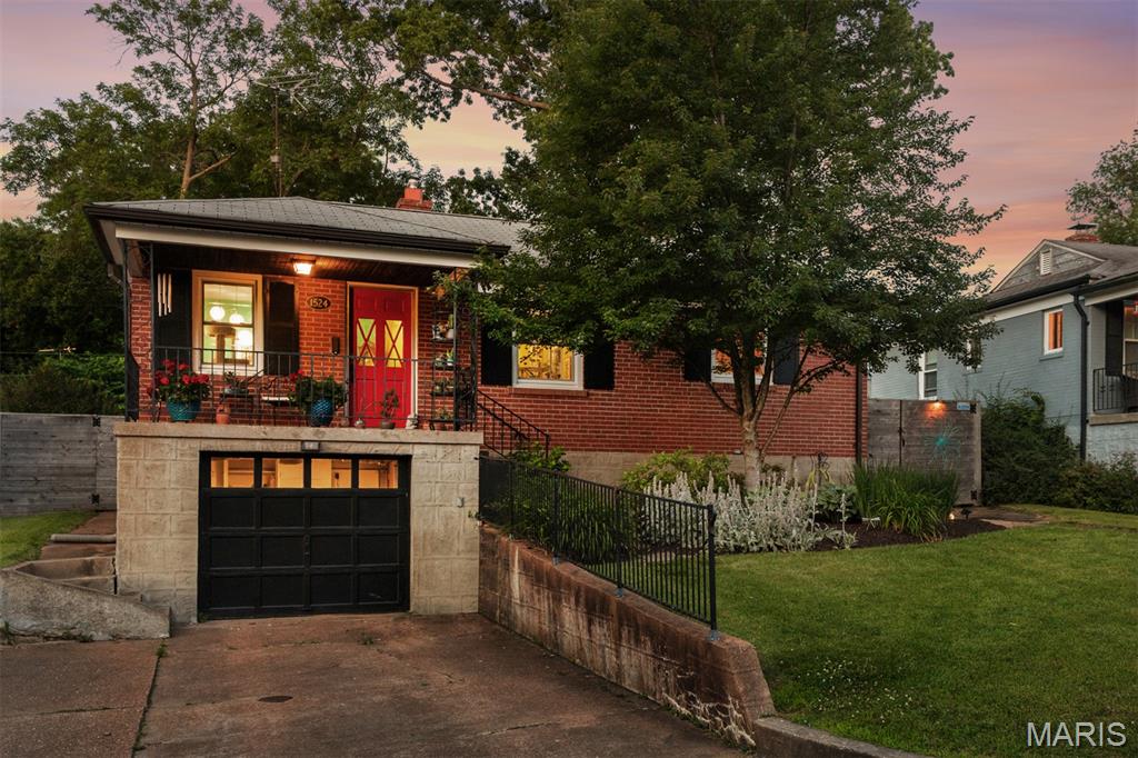 Welcome home! This charming, updated brick ranch in Rock Hill is the perfect find within the highly sought-after Webster Groves School District. Inside, you’ll love the gorgeous hardwood floors, classic arched doorways, and bright, open feel. The layout flows effortlessly from the living room into the separate dining area and kitchen. The kitchen has rich dark cabinets and stainless steel appliances, making everyday living and hosting a breeze. With 2 bedrooms and 1.5 baths, the home also features a fantastic, cozy finished basement. Currently set up as a family TV room and crafting space, the lower level adds a ton of extra living area along with a cozy fireplace, half bath, laundry, and plenty of storage. Outside, a convenient side door leads to your own private backyard oasis. The spacious, level yard is fully privacy-fenced and features a large flagstone patio with a built-in gas fire pit, perfect for weekend BBQs, pets, or your morning coffee. Top it off with an oversized 1-car garage with extra storage space, a walkable location just minutes from local coffee shops and restaurants, and the ultimate peace of mind of a passed Rock Hill municipal inspection. This one is truly ready for you to move right in!
