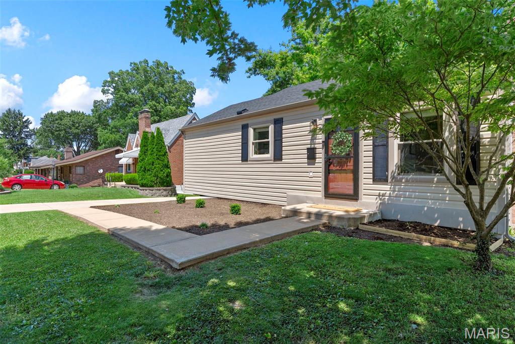 This is the home you've been waiting for! From the moment you step inside, you'll be impressed by the beautifully updated kitchen featuring stainless steel appliances, granite countertops, and a massive convenient breakfast bar, perfect for everyday living and entertaining.

The inviting living room offers a cozy gas fireplace, custom built-in shelving, and gorgeous hardwood floors that extend throughout the main level. Two spacious bedrooms and an upgraded full bathroom complete the main floor. You'll fall in love with the custom craftsmanship of the 

The finished lower level provides even more living space with an expansive family room, a versatile bonus room ideal for a home office, guest room, or workout space, a second full bathroom, and a large utility room with abundant storage.

Step outside to enjoy the fully fenced backyard, complete with a large deck and patio area that make outdoor entertaining a breeze. There's also plenty of green space for gardening, pets, or play.

Conveniently located in the heart of Affton, this home offers easy access to major highways, shopping, dining, and everyday amenities.

Don't miss your opportunity to make this move-in-ready home yours!