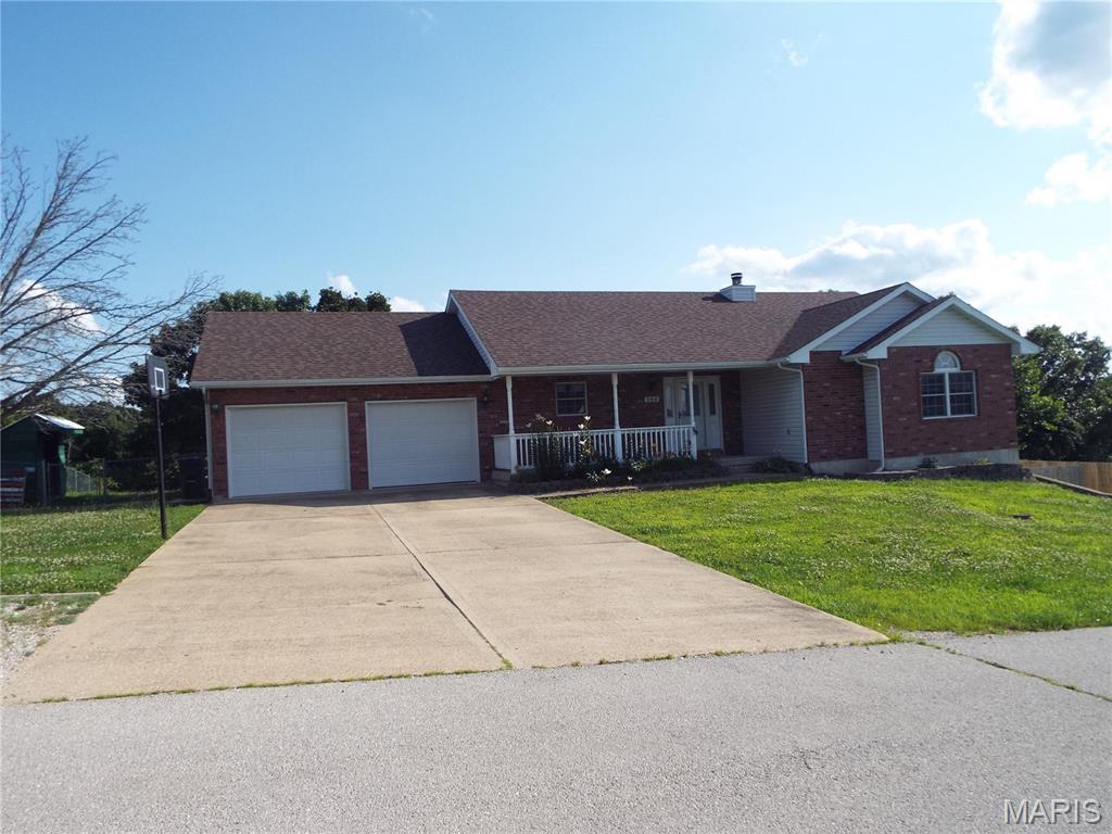 Welcome to beautiful Sawmill Ridge! This charming ranch home offers 3 bedrooms and 3 bathrooms, packed with valuable upgrades. Rest easy knowing the roof is only 5 years old, a water softener is included, and the installed solar panels convey entirely to the new owners with a warranty. The kitchen features a newer dishwasher (2024) and refrigerator (2025). Downstairs, the fully finished walk-out basement boasts a built-in bar and an additional large living or great room that opens up to a huge, fully fenced backyard—complete with landscaping specially planted to attract butterflies and hummingbirds. Cozy up in the winter months by the wood-burning fireplace also new HVAC with warranty. This move-in ready home truly has it all!

Key Highlights:

Eco-Friendly & Efficient: Solar panels convey with a warranty, plus a roof that is only 5 years old and a built-in water softener.

Updated Kitchen: Equipped with a newer dishwasher (2024) and refrigerator (2025).

Entertaining Haven: The finished walk-out basement features a custom bar and a spacious secondary living area.

Outdoor Oasis: Step outside into a massive, fenced backyard featuring thoughtful perennial plantings designed to attract hummingbirds and butterflies.

Winter Comfort: Enjoy chilly Missouri evenings tucked up next to your cozy wood-burning fireplace.

Schedule your showing today to see this beautiful St. Robert home in person!