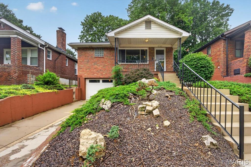 Welcome to 2105 Princeton Place—a deceptively spacious mid-century bungalow offering over 1,900 square feet of finished living space in the heart of Richmond Heights. This move-in-ready home features 3 bedrooms, 2 full baths, a finished lower level, and an oversized one-car garage. Step inside to discover abundant natural light, coved ceilings, glass block windows, hardwood floors, and a beautiful limestone fireplace that highlights the home's timeless character. The spacious kitchen features granite countertops, stainless appliances, and the convenience of main-floor laundry. Three comfortable bedrooms and a full bath complete the main level, while the finished lower level adds valuable flex space with a second full bath—perfect for a family room, home office, gym, or guest suite. Outside, the landscaped, fully fenced backyard is a true retreat with an irrigation system, landscape lighting, and a paver patio including a tranquil koi pond with waterfall. Ideally located just one block from MRH Elementary and minutes from downtown Maplewood shopping and dining, this home offers the perfect blend of character, updates, and an unbeatable location!