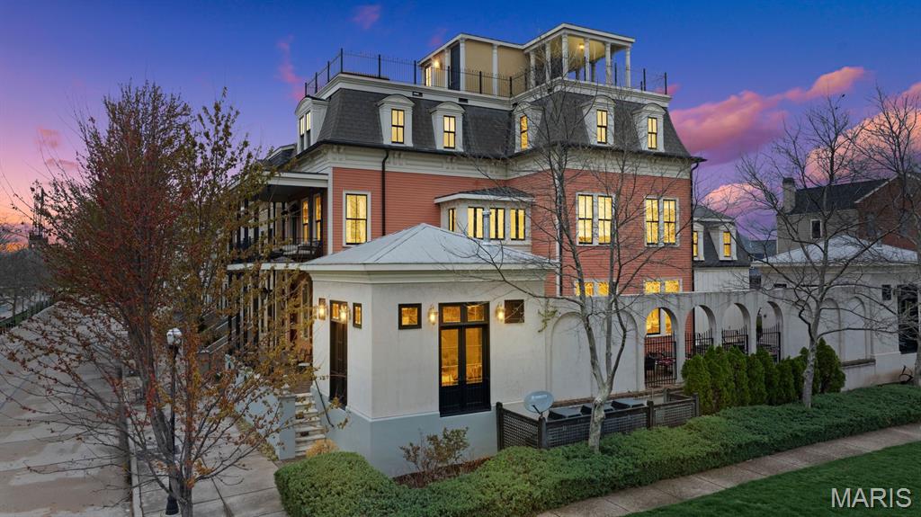 New Town living on the Grand Canal with stunning water views! Boasting over 6000 square feet of the most lavish finishes, every detail has been carefully curated and designed for cozy nights or entertaining a large crowd.  From the sophisticated library, mahogany stairs, doors & trim, temp controlled wine cellar, kitchen w/ an over $36,000 AGA gas range, quartz counters & massive island that opens to the hearth room, this home is truly a masterpiece. 2nd floor offers a master suite w/ his & her bathrooms, & private balcony overlooking the canal. There are two additional bedrooms & two more full baths and a spectacular bunkroom that can sleep four w/ lots of built in storage. 3rd floor has a rec room, a 1/2 bath & another bedroom suite w/ a huge sauna style steam shower. Travel up to the fourth floor and take in the captivating 360 degree views from the rooftop terrace and hot tub!  Lower level is finished complete w/ murphy bed, a 1/2 bath & entertainment center and loads of built in storage.  Every room provides jaw dropping moments!  The convenience of a private, mahagony paneled elevator that services all five floors makes accessability a breeze!  Guest house offers another bedroom & full bath with park views and overlooks the plunge pool and courtyard.  A second building could be a sunroom, studio or office space w/ park & canal views.  There is a four car garage and on top of all that, there is even a golf cart garage!  Exterior feaures solid copper gutters and downspouts, James Hardie Siding, and stunning ironwork.  Your dream house awaits! Be sure to check out the video tour.  Agent owned.