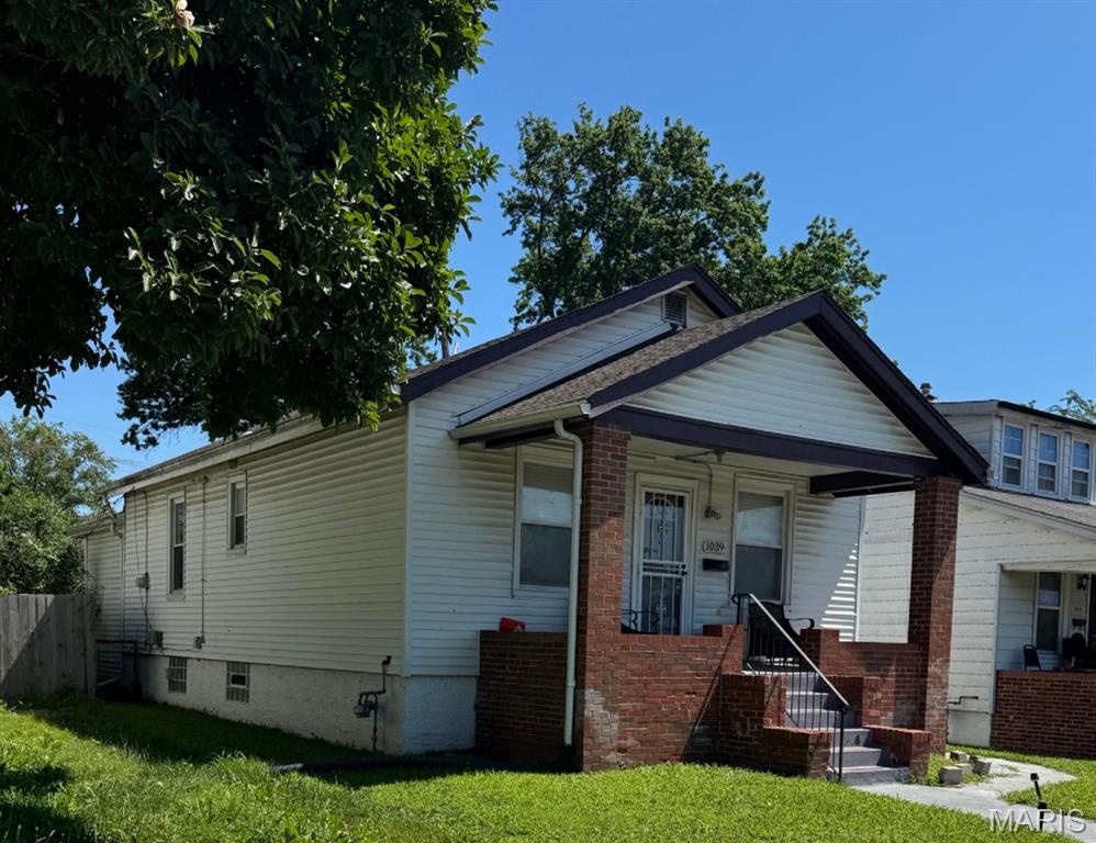 1039 Wall, St. Louis, MO 63147 offers a great opportunity for both investors and future homeowners. Currently tenant occupied and generating $800.00 per month in rental income, this charming bungalow-style home provides immediate cash flow with future owner-occupancy potential. Features include wood flooring, a full basement for additional storage or possibilities, central utilities, and convenient access to highways, shopping, restaurants, and public transportation. Located in an active investment area of North St. Louis, this property is ideal for buyers seeking long-term value or investors expanding their portfolio. Property is being sold AS-IS with seller to make no repairs or inspections. Please do not disturb tenant. Showings available with accepted contract only.