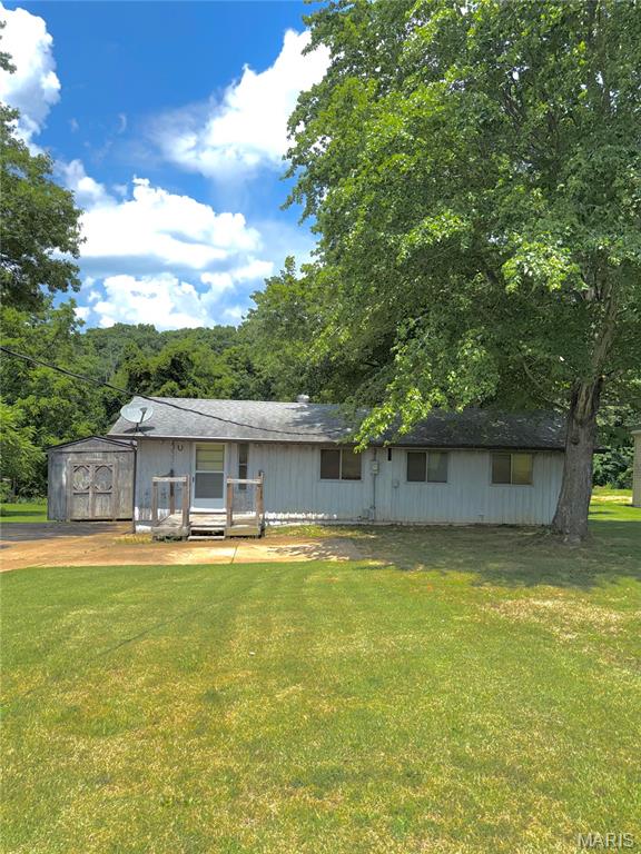 Tucked among mature trees on a gently sloping waterfront lot, this charming home offers the perfect opportunity to own a slice of lake life in the desirable Sunrise Lake Community. Situated on nearly half an acre, the setting provides a peaceful, wooded backdrop with direct lake access—ideal for relaxing weekends or your next project getaway.
This home is filled with character, including vaulted ceilings and exposed wood beams that create a warm, inviting atmosphere. The living area flows into a dedicated dining space with a sliding door that opens to a spacious covered deck—perfect for enjoying morning coffee or unwinding while taking in the natural surroundings.
The home features 1 bedroom, 1 full bath with tub/shower combo, and a convenient kitchen/laundry combination. Appliances included are a 2 year old electric range, 2 year old twin-door refrigerator with in-door ice maker, washer, and dryer, offering added value for the next owner.
Outside, the property includes a paved driveway and a detached shed (approx. 10' x 8') for storage. The wooded lot and lake frontage create an excellent canvas for outdoor enjoyment and future improvements.
Being sold as-is, Roof is approximately 6 years old and water heater is 2 years old. This home presents an opportunity for updates and personalization. With some TLC, this A-frame could be transformed into a cozy full-time residence, weekend retreat, or investment property.
Welcome Home & Enjoy all that Sunrise Lake Community has to offer!