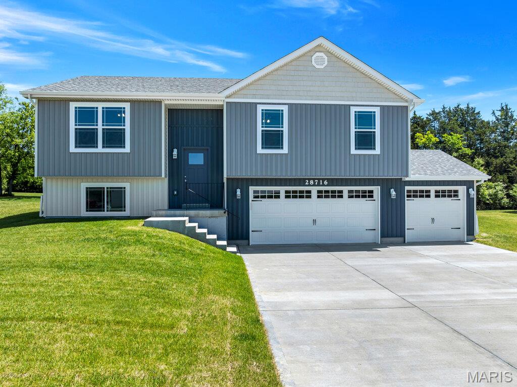 Why wait to build when you can move right in to this beautiful new construction home in a growing new subdivision! This move-in ready 3 bedroom, 2 bath home offers the perfect combination of style, comfort, and convenience — without the wait of building from scratch. Featuring a charming Craftsman-style exterior elevation, this home welcomes you with modern finishes and an open-concept layout designed for today’s lifestyle. The kitchen boasts 42” cabinets, granite countertops, and a large center island perfect for entertaining, meal prep, or casual dining. An expansive 3-car garage measuring approximately 31.3 x 29 provides exceptional space for vehicles, storage, hobbies, or a workshop area. The lower level is ready for your finishing touches and includes a rough in for an additional bath. Spacious bedrooms, quality craftsmanship, and thoughtful design make this home a must-see. Enjoy the opportunity to own a brand-new home in an up-and-coming community. This home is privately owned and is not being sold by the builder.