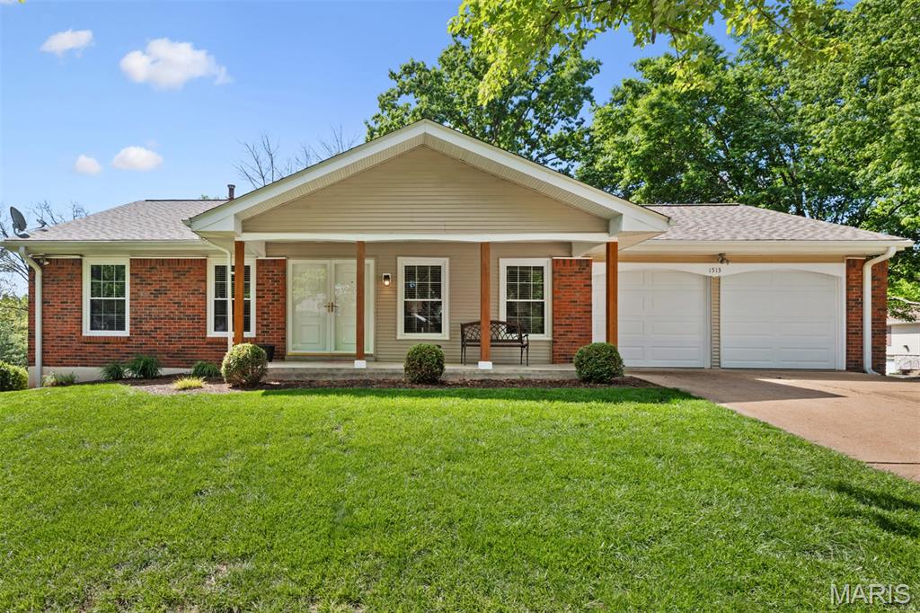 Beautiful ranch style home in the Parkway School District featuring 3 bedrooms, 2 full bathrooms and an attached 2-car garage. Large front covered porch welcomes you into the spacious living room with gorgeous hard wood flooring throughout. Just to the left of the living room is a nice-sized office/den with a closet that can easily be converted back to a bedroom. Large separate dining room with brick fireplace boasting tons of natural light from the sliding glass doors that lead out to the back deck. The kitchen is complete with tons of beautiful custom white cabinets, quartz countertops, tiled backsplash and stainless-steel appliances. A huge window over the sink gives the best view of the backyard. The master bedroom offers a lot of space with a private updated master bathroom and a large walk-in closet. Additional nicely sized bedroom and another convenient updated full bathroom complete the main level of this home. The lower-level walkout basement has been partially finished with a family room extended with a huge laundry room offering plenty of space for storage and/or a personal gym area. The remainder of the basement is unfinished with a hobby/workspace and lots of storage area. Be sure to check out the oversized back deck perfect for entertaining guests or relaxing on a beautiful day that overlooks the large backyard. The deck leads down to a covered patio space with access to the basement. Landscaping details can be found around the entire home to compliment this wonderful piece of property. Some recent updates include a new roof in Fall 2024, new water heater in 2026 and kitchen remodeled in 2023. Do not hesitate to make your appointment today to check out this great home!