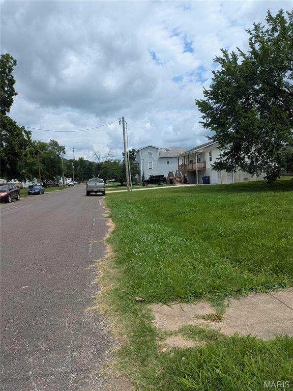 Lot is located just south of the business district, and only two blocks from Liberty Fields. Easy access to all utilities if looking to build on the lot! Zone M1 - manufacture zoning that allows for residential, so many possibilities for this great location!
