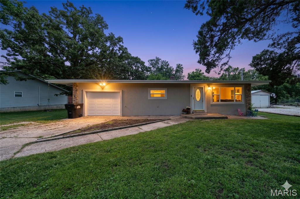 Welcome to this charming ranch-style home situated on nearly half an acre just outside the St. James city limits! Offering 2 bedrooms, 1 bathroom, a full unfinished basement, and a spacious level yard, this property provides the perfect blend of comfort and potential. The beautifully updated kitchen features stainless steel appliances, while the bright, generously sized rooms create a warm and inviting atmosphere throughout. Completely remodeled in 2022, this home boasts numerous upgrades including new HVAC, updated wiring, new flooring, and a fully renovated kitchen. Meticulously maintained since, this move-in-ready home offers exceptional value and is ready for its next owner to enjoy.