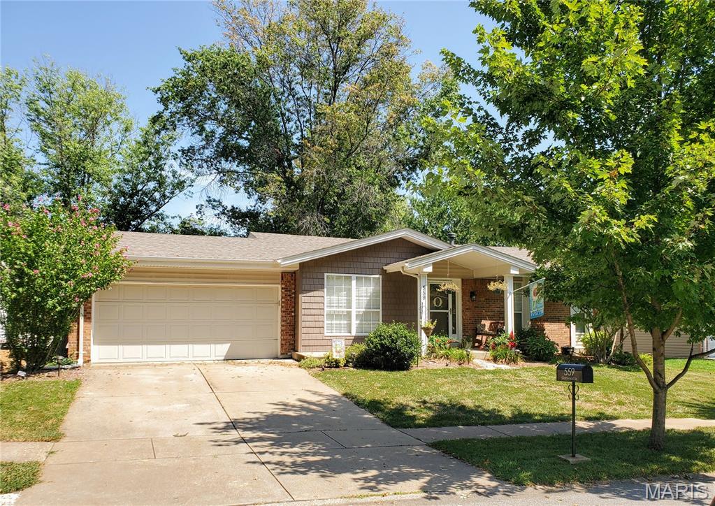 Professional pictures coming soon.  
Welcome home to this beautifully updated ranch in the heart of Ballwin, located in the highly desirable Rockwood School District! This spacious home offers 3 bedrooms and 2 full baths on the main level, plus a finished walkout lower level featuring a large recreation room, den, third full bath, and workshop.
The updated kitchen is designed for both style and function with soft-close drawers and wood cabinetry, cabinet pantry with pull-out shelves and deep pantry closet, stainless steel appliances including a three-door refrigerator with dispenser, microwave, gas five-burner range/oven, and dishwasher. The adjoining family room features a sliding glass door that opens to the deck, creating an ideal space for indoor-outdoor living.  A generous great room with newer carpet and ceiling fan provides flexible living space and could easily serve as a combined living and dining room.
The primary suite offers newer carpeting, a ceiling fan, a nicely updated bath with tile flooring, wood vanity, and tiled walk-in shower with glass doors. A spacious walk-in closet, converted from the original fourth bedroom, provides exceptional storage. Bedrooms two and three feature hardwood floors and ceiling fans with lights. The updated hall bath includes tile flooring, a wood vanity, and a tub/shower with tiled surround.
 Additional highlights include a two-car attached garage, walkout lower level, workshop, and large yard.  Numerous updates throughout.  
Conveniently located near parks, shopping, dining, and major highways, this move-in ready home combines comfortable living with an outstanding Ballwin location.