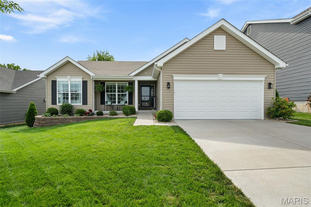 Exceptionally kept property in the heart of O’Fallon offering comfort, functionality, and thoughtful upgrades throughout! From the beautifully maintained landscaping and lush lawn to the privacy hedges lining the backyard, pride of ownership is evident the moment you arrive. Located in a neighborhood with a short stroll to the elementary school, this home offers the perfect setting for families, pets, and everyday living.
Step inside to discover fresh new paint throughout and a warm, inviting layout designed for both relaxation and entertaining. The finished walkout basement adds incredible living space and includes a versatile flex area along with a dedicated den/office space perfect for working from home, hobbies, fitness, or a media room.
The fenced backyard provides a safe and private outdoor retreat for kids and dogs, while the permanent exterior trash can enclosure adds both convenience and curb appeal. A sprinkler system helps maintain the beautiful lawn with ease.
Car enthusiasts, hobbyists, or anyone needing extra workspace will love the fully finished, insulated, and climate-controlled garage complete with its own mini-split HVAC system. The garage also features built-in toolbox cabinets, countertops, and exceptional storage and workspace functionality. Even better, the garage cabinets and toolboxes stay with the home.
This property is loaded with valuable extras and smart features including a hard-wired surveillance camera system with no subscription cost, generator-ready natural gas and electrical connection, and numerous included items that add tremendous value. The refrigerator, stackable washer and dryer, surveillance equipment and cameras, and all mounted TVs will remain with the property, making this home truly move-in ready.
Combining thoughtful updates, flexible living spaces, exceptional garage amenities, and a fantastic location, this home offers a rare opportunity to own a meticulously maintained property with features rarely found at this price point. Don’t miss your chance to make this incredible home yours!
