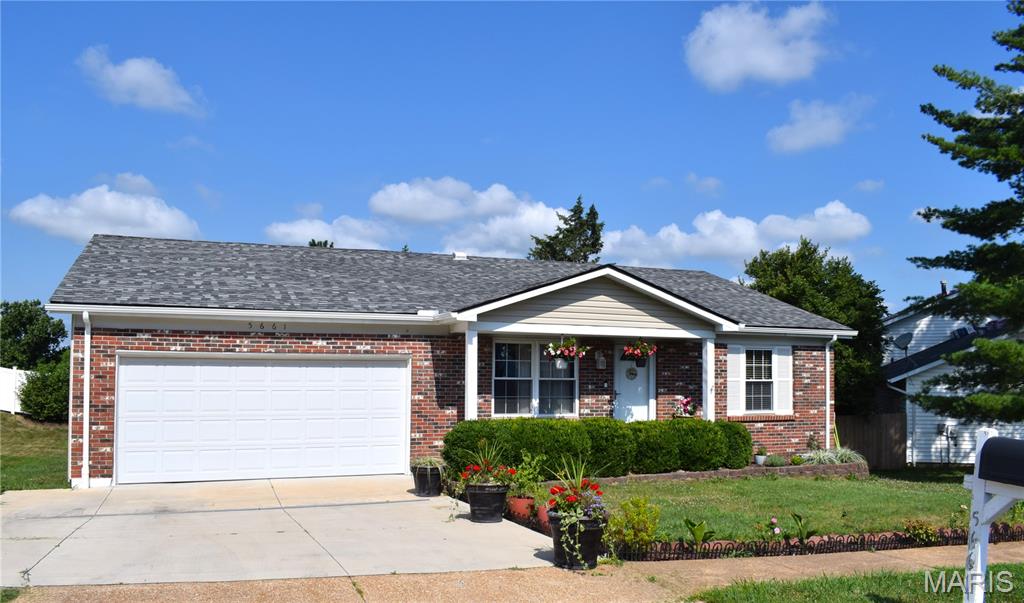 Highly desired 3 Bed / 3 Full Bath Ranch home w/oversize 2 car garage is in lovely Chalet Forest subdivision and is located on the end of a quiet cul-de-sac street.  The home has been very well maintained.  From the covered porch step inside to the spacious living room with beautiful hardwood floors which lead to the kitchen space w/newer countertops, lots of cabinet space, breakfast bar and large breakfast room.  Open to the kitchen area is the family room with beautiful brick fireplace and wood flooring!  Newer sliding door w/built in mini blinds leads to the Brand New Deck overlooking the nice size backyard.  Primary bedroom has updated en suite with walk-in closet.  2 spacious bedrooms and updated full hall bath complete the main floor.  Walk-out Lower Level has large recreational space with Newly Added 3rd Full Bathroom and lots of storage space.  Large concrete patio at the w/o is great for added entertaining area.  New Roof (May 2025) and New Siding (May 2025) too!  Wood flooring and some fresh neutral paint add to the homes charm.  Conveniently located to shopping, restaurants, schools, medical, parks & major highways.  Become the lucky new homeowner today!