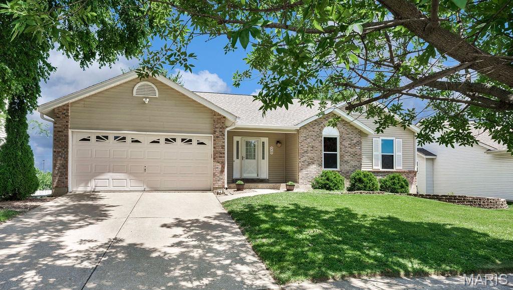LOCATION, UPDATES & SPACE TO ENTERTAIN - this one has it all! Situated on a cul-de-sac lot in a highly convenient location near shopping, dining, and major highways (70, 94, and 364), this beautifully maintained ranch offers the perfect blend of comfort and functionality. From the moment you arrive, you'll appreciate the attractive curb appeal and thoughtfully landscaped yard. A new cedar deck (2022) provides the perfect spot to enjoy your morning coffee or unwind at the end of the day, with stairs leading to a patio and backyard below. And, the storage shed is included for added convenience. Inside, the vaulted great room serves as the heart of the home, featuring two skylights, a gas fireplace, and an open, inviting feel. The eat-in kitchen offers a full pantry, stainless appliances (refrigerator stays!) and has been tastefully refreshed (2026) with new LVP flooring, updated countertops, stainless sink and faucet. You're sure to appreciate the convenient main floor laundry with stylish shiplap accents and storage cabinets. The primary suite features a beautifully remodeled bath with a double-bowl marble vanity, undermount sinks, framed mirror, updated lighting, subway tile shower, and modern glass doors. The finished walk-out lower level expands your living space with 9-foot ceilings, a full bath, 4th bedroom with walk-in closet, spacious family room, and an impressive 12-foot bar that's ready for game days, celebrations, and gatherings with family and friends. Additional improvements include roof (2016), windows (2021): triple-pane on the back of the home & double-pane on the front, sliding doors (2021), water heater (2022), furnace (2015), AC (2018), laminate flooring in the lower level (2020), and 6-inch gutters and downspouts (2024). PLUS, the oversized 2-car garage includes electric vehicle charging capability. A home that offers thoughtful updates, flexible living space, and a fantastic location—ready for its next chapter and YOU!