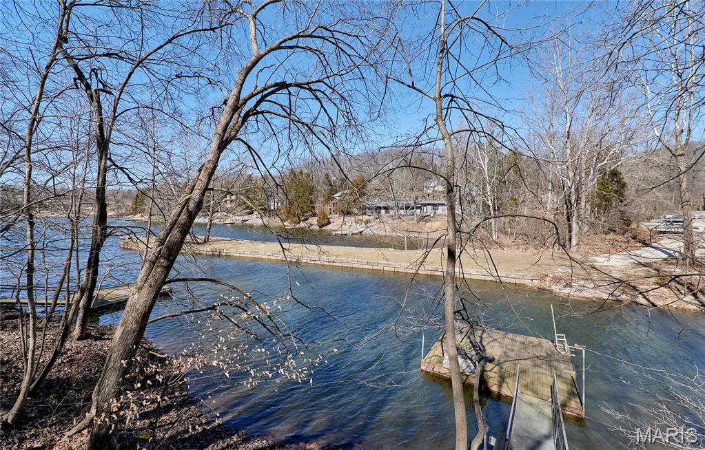 Check out this beautiful lake front lot on the big lake in Lake Sherwood Estates! Nestled in the trees with a boat dock. shed and electric service already on the property. This fabulous, gated community has 6 lakes, new community center, swimming pool, snack bar, swim beach, volleyball courts, pavilions and ballfields. Lots on the main lake don't come on the market very often. Is your family ready for the Lake Sherwood lifestyle?? STAIRS ON PROPERTY ARE OLD WITH NO HANDRAILS USE EXTREME CAUTION WHEN SHOWING.