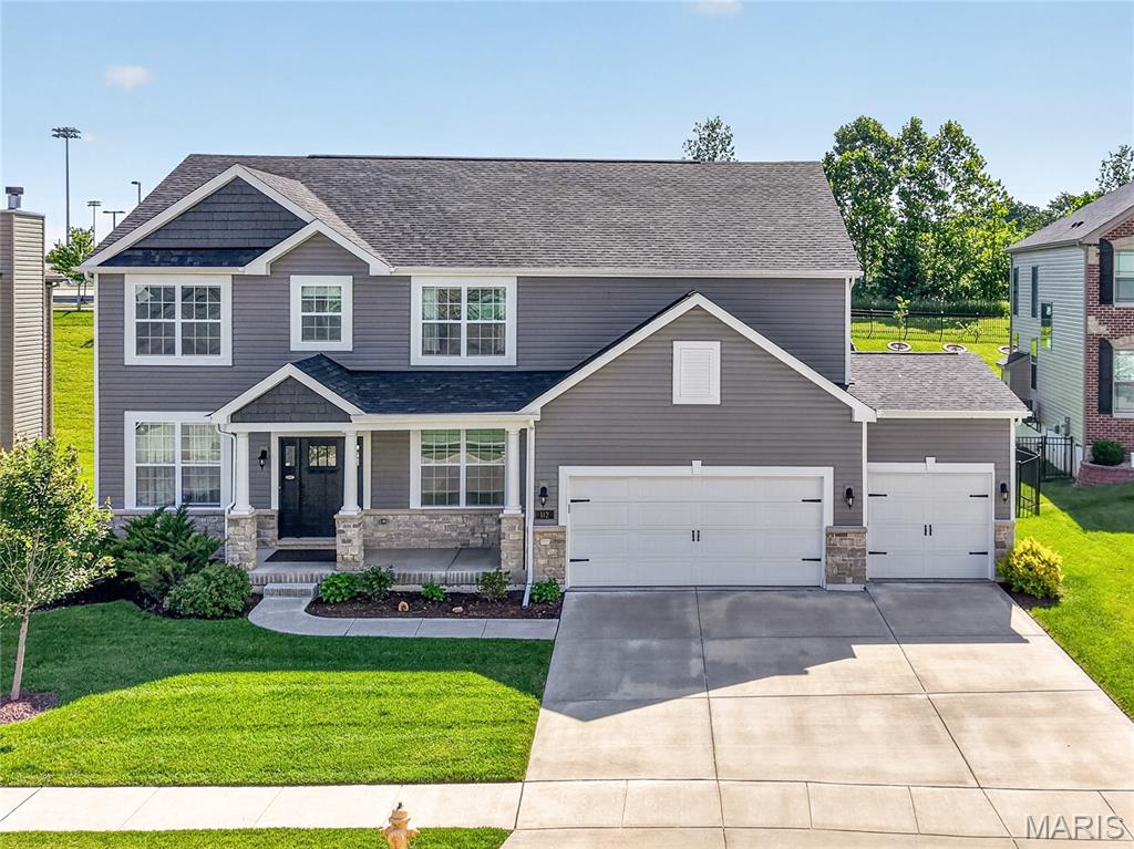 Welcome to a home designed to elevate everyday family living, where timeless elegance meets modern comfort and every space invites you to slow down, gather, and truly enjoy the moments that matter most. Built by high rated Lombardo Homes-offers over 3,000 sq ft of beautifully designed living in the premier Streets of Caledonia community within the highly sought-after Wentzville School District.
The stunning two-story great room is the heart of it all, filled with natural light from a dramatic wall of windows, where soaring ceilings and an impressive stone fireplace surround create an inviting space for cozy evenings and effortless entertaining. 
The gourmet kitchen seamlessly connects, featuring quartz countertops, an expansive island, thoughtful storage details, a walk-in pantry, double oven, a five-burner gas cooktop with pot filler-all beautifully framed by a custom stone arch and hood. A cooking and connection space designed for everything from casual breakfasts to lively gatherings with family and friends.
The main level graceful foyer opens to an elegant dining room and a private office with French doors-perfect for quiet mornings, working from home, or unwinding at the end of the day.
Upstairs, the primary suite offers a peaceful retreat with an oversized walk-in closet and a spa-inspired bath complete with dual vanities, a soaking tub, and a separate shower. Three additional spacious bedrooms provide comfort and privacy, each with direct bathroom access, including a Jack-and-Jill layout and a private ensuite—ideal for family, guests and multigenerational living. A second-floor laundry room adds an extra layer of everyday convenience.
Step outside to a private, fenced backyard with a patio ideal for relaxing, playing, or hosting under the open sky. The unfinished lower level with bath rough-in offers endless potential to create your perfect space.
Enjoy a vibrant community with resort-style amenities including pool, splash pad, playground, fitness center, paved trails, pickleball courts, stocked lakes and expansive green space and nearby conveniences including adjacent restaurants, movie theater, scenic outdoor recreation and easy access to I-64, Mastercard, shops and everyday essential-offering the perfect balance of connection, comfort, and lifestyle.
This is more than a home-it’s a place to live, relax, and create lasting memories.