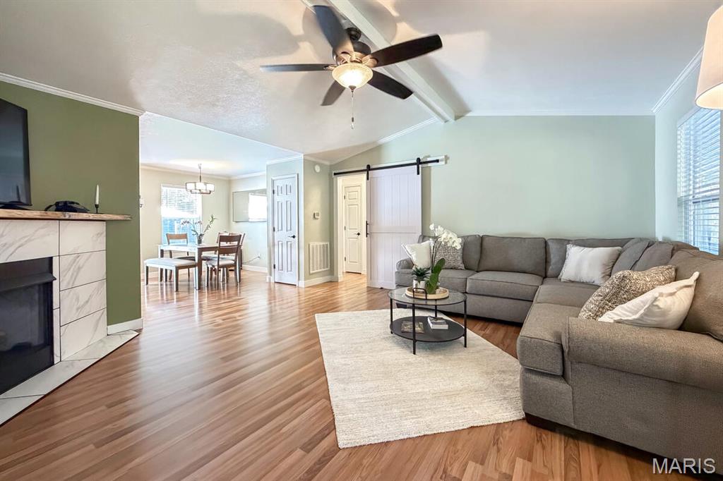 529 SF MAN CAVE / WORKSHOP + 400 SF REC ROOM + FURNISHED 1,748 SF 3-BD / 2-BA HOME w/ SCREENED PATIO, BBQ PATIO & OUTDOOR FIRE PIT ON 7.37 wooded ACRES – Move-In Ready!
This beautiful and fully furnished 3-bedroom, 2-bath home sits on 7.37 acres of mostly wooded land, offering privacy, peace, and a true move-in-ready experience! Easily adaptable to fully off-grid living. Excellent for buyers seeking preparedness, energy independence, and long-term self-sufficiency. Recently updated, this home combines comfort, functionality, and efficiency with thoughtful touches throughout. Step inside to a semi open floor plan filled with natural light. The living room features a cozy gas-log fireplace with a stunning white pine mantel, flowing seamlessly into the kitchen and dining areas—perfect for entertaining. The fully stocked kitchen is ready for meal prep and gatherings with family or friends.
The primary suite is located on the north side of the home and includes a private powder room, double sinks, and a spacious walk-in closet. On the opposite side, two bedrooms and a full bath can be closed off from the main living area with a sliding barn door for added privacy. A small office area is conveniently located off the kitchen, leading to the laundry room equipped with a washer, dryer, hot water heater, and a whole-house water softening system. Enjoy additional living space in the 20’x20’ bonus room—ideal for a family room, entertainment area, or craft space. Beyond that lies a 23’x23’ fully equipped workshop/maker space, perfect for hobbyists or DIY enthusiasts.
Outside, you’ll find a screened-in front porch for relaxing and watching wildlife, plus a patio with outdoor furniture, BBQ grill, and smoker—great for gatherings around the fire pit. The property also includes a 2-car carport, three storage sheds, a rabbit hutch area, small garden plot, and an RV/camper concrete pad.
Additional Features Include: 58 Panel Owned Photo Voltaic Solar Power System with battery backup — average electric bill only ~$49/month with A/C running 24/7 during the summer. Starlink Satellite Internet Service. New HVAC System with Owned Heat Pump. HAM Radio Antenna wired into a bedroom closet. Screened Patio & Outdoor Fire Pit. Equipped Carpentry Workshop/Maker Space. Owned Video Surveillance System. Husqvarna Riding Lawn Mower with accessories. Appliances Included: Refrigerator, beverage/wine fridge, glass-top range with oven, microwave hood, dishwasher, toaster oven, two chest freezers, small workshop fridge, and washer/dryer. 2-Car/Truck Carport with battery jump starter. 3 Storage Sheds & Security Light. Whole-House Soft Water System & PEX Mana Block Water Distribution System. 200-Amp Electrical Panel.
This property is laid out perfectly to accommodate the addition of another home if desired. Whether you’re looking for a peaceful permanent residence, a weekend getaway, or a self-sufficient retreat, this property is ready for you to move in and start enjoying from day one!