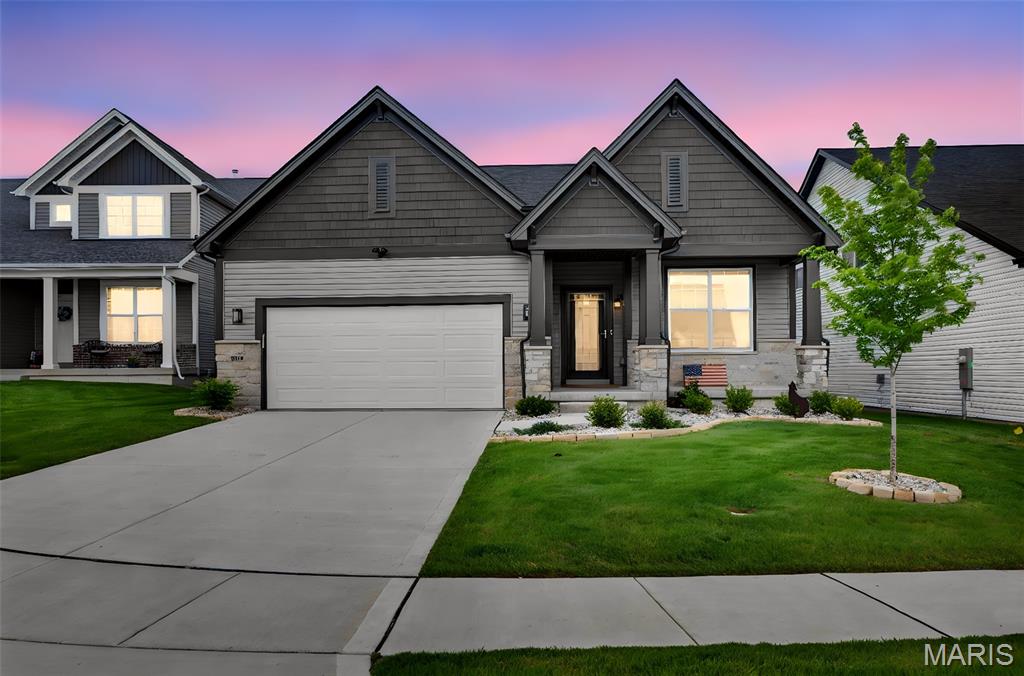 Why wait months to build and spend tens of thousands more on upgrades when you can own this exceptional, move-in ready home today? Just reduced to $699,900, this property represents an extraordinary opportunity with approximately $816,000 invested in construction and post-closing improvements, creating value that would be difficult and significantly more expensive to recreate today. Be sure to review the attached upgrade sheet to fully appreciate everything included. Designed well beyond typical builder specifications, this beautifully appointed home offers the perfect blend of luxury, comfort, and practicality. The open-concept floor plan is enhanced by soaring 11-foot ceilings in the great room, where a sleek contemporary electric fireplace and mounted television create an impressive focal point. The designer kitchen is equally impressive with quartz countertops, an oversized center island, premium appliances, gas cooktop, stylish backsplash, and abundant workspace for both everyday living and entertaining. One of the home's most remarkable features is the Patriot four-season sunroom, a substantial investment complete with its own dedicated mini-split HVAC system, allowing year-round enjoyment while seamlessly expanding the living space. Just outside, the grilling deck makes indoor-outdoor entertaining effortless. The thoughtful upgrades continue throughout the home, including a private office with French doors, engineered flooring throughout the main living areas, custom pantry and primary closet organization systems, reverse osmosis water system, epoxy-coated garage floor, and a premium appliance package with refrigerator, washer, and dryer all included. Outside, the fully fenced backyard has been professionally finished with premium antimicrobial turf, providing a beautiful, green, virtually maintenance-free outdoor retreat in every season. The unfinished lower level includes a bath rough-in and offers outstanding potential for future living space, allowing the next owner to customize it to their needs. Every finish, upgrade, and improvement reflects an unwavering commitment to quality, making this the perfect home for buyers who appreciate the details that truly set a property apart.