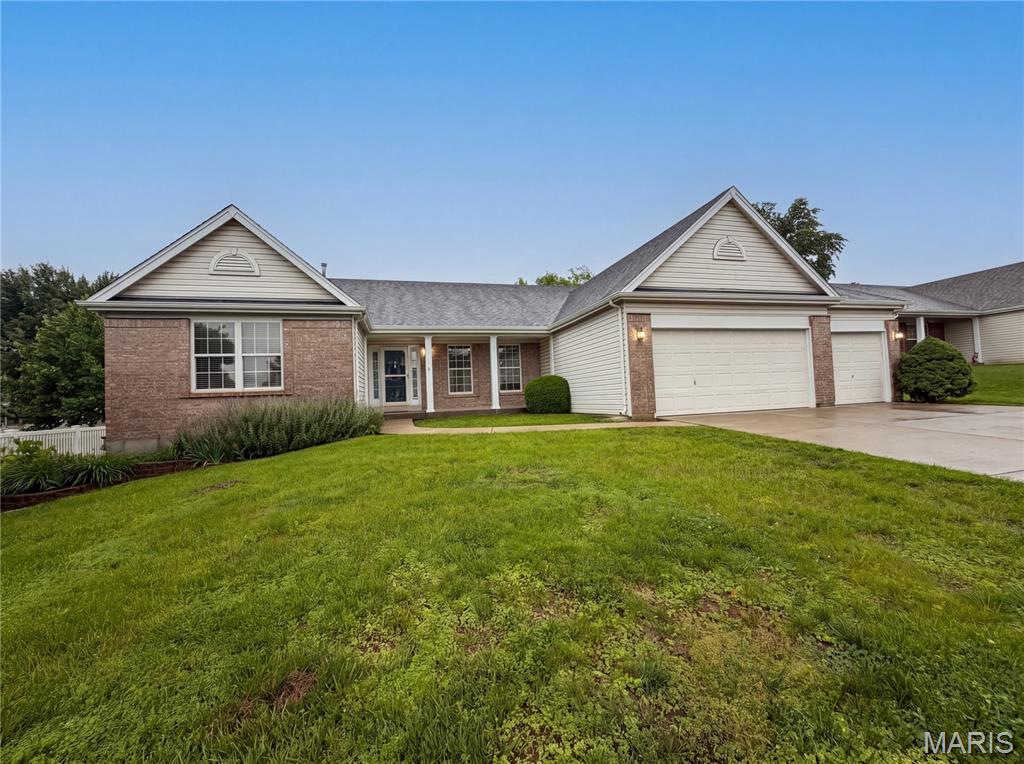 Check out 2212 Harborside Dr, recently updated with fresh interior paint and partial flooring replacement. A cozy fireplace complements the kitchen's all stainless steel appliances. The primary bathroom features double sinks and a separate tub and shower. Outside, discover a pleasant patio and a fenced in backyard. This residence combines modern updates with everyday comfort. Included 100-Day Home Warranty with buyer activation
