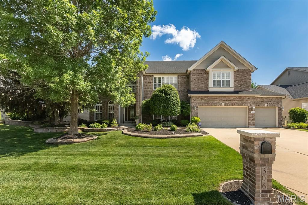 Welcome to a spacious O’Fallon home offering an impressive amount of room, a flexible floor plan, and a highly convenient location close to everyday amenities. With 5 bedrooms, 5.5 bathrooms, a finished walk-out lower level, and multiple living areas, this home provides plenty of space for everyday living, entertaining, guests, and work-from-home needs. The main level features an open floor plan with a spacious kitchen, breakfast room, and family room with fireplace, creating a great flow for gathering and daily living. A main-floor guest suite or in-law quarters with its own full bathroom adds flexibility for visitors, extended family, or a private home office option. Upstairs, the impressive primary suite is a true retreat with a luxury bathroom featuring a large shower, soaking tub, separate vanities, and a huge walk-in closet. The second floor also offers a loft area, generously sized secondary bedrooms, a Jack and Jill bathroom, plus an additional full hall bathroom. The finished walk-out basement adds even more functional living space with a 6th sleeping area, full bathroom, large recreation/family room areas, and an oversized walk-in storage closet. The flat, level backyard provides plenty of usable outdoor space and includes natural fruit-bearing trees, creating a peaceful setting to enjoy. Come take a look at this amazing home soon!