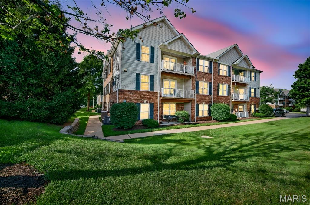 NO STEPS TO GET INTO THE BUILDING! This condo is on the second floor but has an elevator and a ramp to the front door of the building. Welcome home to this well maintained, one owner condo offering comfort, convenience and accessibility. This spacious 2 bedroom, 2 full bath home features 1056 square feet of thoughtfully designed living space, including in-unit laundry for everyday ease. Enjoy your morning coffee or unwind in the evening on the private balcony. Additional storage is available in the basement, and a covered parking space provides protection from the elements year-round. The building offers exceptional accessibility features, including a no-step entrance with ramp access and elevator making it easy to navigate for residents and guests. Pride of ownership shines throughout this one owner home which has been lovingly cared for and is ready for its next chapter. Conveniently located, low maintenance living waiting for you!
