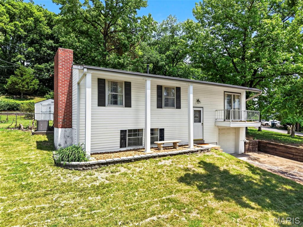 Don't miss this beautifully updated 3-bedroom, 1.5-bath home in the sought-after Northwest School District! From the moment you walk in, you'll appreciate the fresh, move-in-ready feel with luxury vinyl flooring throughout, white 6-panel doors and trim, and a charming bay window that brings in abundant natural light. The stylish kitchen is sure to impress with white shaker cabinetry, quartz countertops, stainless steel appliances, and a clean, modern look buyers love. The updated hall bath features a white vanity, updated fixtures, and a tub/shower surround, while the primary bedroom offers the convenience of its own private half bath with white vanity and laminate flooring. All bedrooms include ceiling fans for added comfort. Need extra living space? The finished lower level offers a spacious family room with a cozy fireplace and laminate flooring—perfect for movie nights, game days, a home office, or play area. A 1-car garage, numerous updates throughout, and a location close to parks, shopping, restaurants, and commuter routes make this home an outstanding value. Just unpack and enjoy! (sq ft is incorrect on tax record)