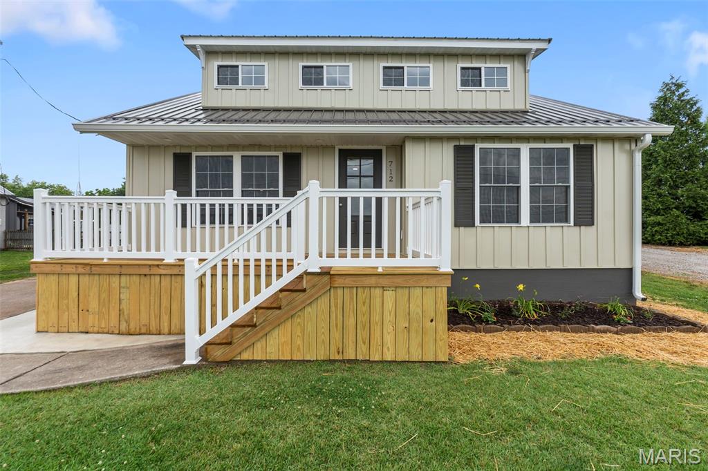 Step into modern comfort and style with this fully remodeled story-and-a-half home offering 3 bedrooms and 3 full baths! Every detail has been thoughtfully updated, featuring beautifully tiled showers, main level laundry, all-new cabinetry, sleek countertops, tiled backsplash, and stainless steel appliances that make the kitchen shine. This home blends charm with contemporary finishes and offers many modern updates throughout. Relax by the cozy fireplace or enjoy the convenience of the attached one-car garage. Need extra space? The 24x36 concrete slab is already in place — perfect for building your dream shop, additional garage, or hobby space. Move-in ready and packed with upgrades, this property offers the perfect combination of comfort, functionality, and style. Don’t miss your chance to make this beautifully renovated home yours!