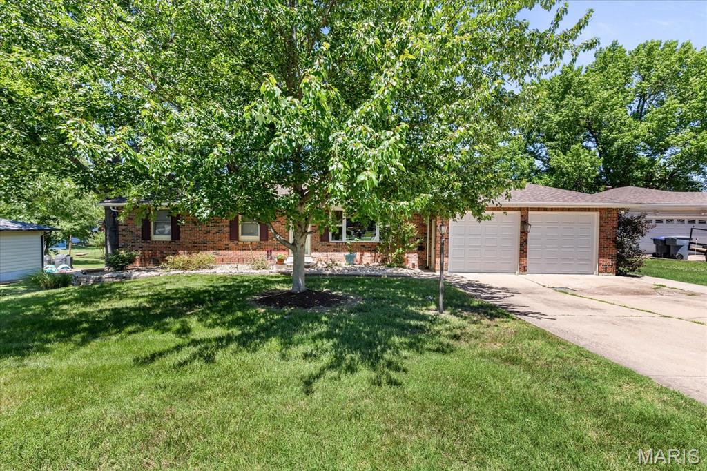 SHOWINGS BEGIN 6/19!!! Beautifully maintained sprawling ranch offering over 1,800 sq ft on the main level (2800 sq ft total) with 3 bedrooms, 3 full baths, and a finished walk-out lower level! This solid, quality-built home features numerous updates throughout including roof & siding (2024/2025), zoned HVAC with dehumidifier (2024), updated electric, replacement windows, and Anderson doors. The oversized kitchen boasts custom 42” cabinetry, marble flooring, built-in pantry, newer stainless steel appliances, can lighting, and a spacious breakfast room. Cozy living room includes a stunning stacked stone fireplace and newer LVP flooring. The finished lower level offers incredible additional living space with a full bath, second fireplace, and two bonus rooms perfect for an office, workout room, or possible sleeping area. You are going to love how private the backyard feels and enjoy relaxing or entertaining on the expansive patio featuring a built-in firepit. Homes with this level of craftsmanship and care are hard to find—schedule your showing today!