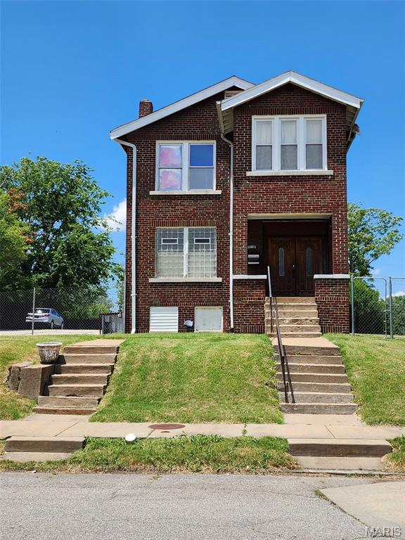 HUGE PRICE REDUCTION!!!!!! Attention Pastors, Entrepreneurs, Commercial Business Owners, and General Public. This is a unique multiplex/mixed-use building opportunity to walk into a turnkey asset with potential income. This property is currently being used as a House of Worship, but can be used as a single-family or Duplex home.  Re-imagine. As you enter the beautiful entry foyers, which have been re- imagined to greet and welcome your guests with quick access to the separate men's and women's bathrooms. The sanctuary can seat 50-75 people. It is cooled by a window unit and ceiling fans. It has a functional heated baptismal pool. All of the pews will stay. There is an organ, a piano, located in the sanctuary, which will stay. The main level is handicap accessible. The basement is perfect for storage space. The parking lot can hold up to 20 plus cars. The bonus with this building comes with 3 additional lots: 2743, 2801, and 2803 Arlington Ave. It gets even better.. 
The 2nd floor of this building offers 3 bedrooms, 1 bath, a fully functioning kitchen, and 2 sunporches in the front and back of the building. The upstairs unit has central air. A fully reimagined property with an uncommon flexibility with income potential through the 2nd-floor unit. Adaptable for community, event, residential, daycare, office building, or event space, comes complete with ample parking and room for future expansion. A very versatile institutional property is a great fit for the St. Louis-area religious organizations, nonprofits, educational institutions, or community-focused enterprises looking for more space at a fraction of the cost. Bring your members and board on this one. This property is being sold as-is.
