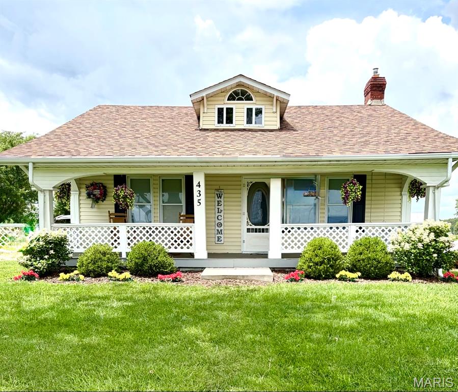 Peaceful luxury meets everyday convenience just minutes from Wentzville. This is more than a home, it's a lifestyle! Tucked away in a peaceful, park-like setting, this picture perfect home offers the rare opportunity to enjoy privacy, space, and endless possibilities without sacrificing proximity to town. Step inside to a bright, inviting interior that has been beautifully updated from top to bottom. The stunning kitchen features all new cabinetry, gorgeous quartz countertops, abundant storage, and plenty of room to gather. Fresh paint and new flooring flow throughout the home, while updated vanities, tubs, and toilets give each bathroom a fresh feel. The main level offers two bedrooms, two full bathrooms, a separate dining room, and an oversized laundry/mud room that makes country living effortless. Upstairs, you'll find a spacious third bedroom with an adjoining half bath, offering the perfect retreat for guests, a private home office, or a flexible bonus space to fit your lifestyle. A second entrance at the rear of the home provides added convenience and flexibility. This home has been thoughtfully maintained with major mechanical updates already completed, including a new HVAC system (2024), new water heater, a basement drainage system with an additional sump pump, a new roof (2020), and a new septic system (2020) giving buyers peace of mind for years to come. Outside is where this property truly shines. Whether you're dreaming of a farm, home business, workshop, or simply room to spread out, the impressive collection of outbuildings delivers. A massive 90' x 40' pole barn, 40' x 46' barn, and an additional 21' x 31' detached garage with electricity provide exceptional storage for equipment, boats, RVs, vehicles, and more. Behind the pole barn, you'll also find a 50' x 20' concrete pad, offering even more versatility for future projects. Spend your mornings enjoying the front porch in your rocking chair, taking in the peaceful and quiet surroundings. In the spring, watch baby ducks glide across the pond while the kids fish for catfish and bluegill in their own backyard. Whether you're relaxing outdoors, watching wildlife, or simply soaking in the serenity, this property offers the kind of peace that's becoming increasingly difficult to find.

Properties like this rarely become available. If you've been searching for the perfect blend of country charm, modern comfort, breathtaking acreage, incredible outbuildings, and an unbeatable location just outside Wentzville, you've found it! This property is generating incredible interest before hitting the market! Showings begin Thursday, July 30, and will continue throughout the weekend. Sellers will review all offers after the weekend and plan to make a decision on Monday. Don't miss your opportunity to tour this exceptional property and submit your strongest offer.