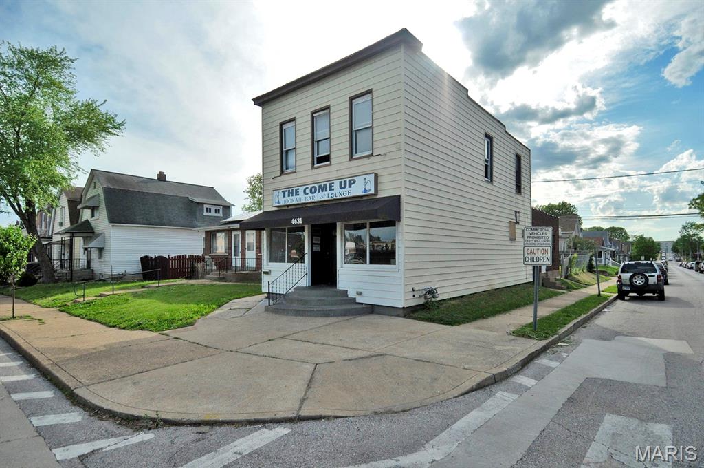 The mixed-use property offers a versatile layout that bridges the gap between a traditional storefront and modern Industrial workspace. The combination of the open main floor, the existing bar structure, and the second-floor apartment allows for several business models. It could be used for Boutique Bar, Creative Agency, Professional Office, Art Gallery, Event Space. The Bevo neighborhood recognized as an upcoming area. Walking distance to Bevo Windmill is a historic icon of St. Louis, gives your business immediate recognizable identity.