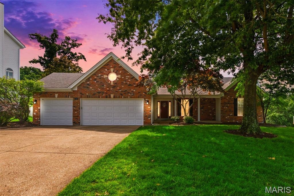 Welcome home to 1634 Strecker Ridge Ct., a gorgeous atrium ranch on a quiet cul-de-sac in Wildwood, nestled in the highly sought-after Lafayette School District. From the moment you step inside, you will be greeted by morning sun pouring through a stunning wall of atrium windows, bathing the entire home in beautiful natural light. The kitchen has been freshly painted & boasts newer higher end appliances with Bosch, Samsung, and GE premium models, luxurious quartz countertops, and a breakfast area with direct walk-out access to the deck. Rich, warm hardwood floors flow seamlessly through the great room and all main-level bedrooms. The primary bedroom is a true retreat; spacious and vaulted, with two walk-in closets, complete with an updated, private en-suite bathroom featuring MOEN fixtures with a separate tub and shower.  The recently renovated walk-out lower level features durable, luxury vinyl plank flooring, a vast, open rec room, provides an excellent space to gather. Downstairs also offers flexible living space; a large fourth bedroom, a third full bath, and a generously sized fifth bedroom currently used as a home office.  Major mechanical updates include architectural shingled roof (2015), American Standard HVAC (2021), and some energy-efficient windows (2023). Exterior highlights include a covered porch, roomy three-car garage and a fenced-in backyard. Tucked away just off Strecker Road, offering a quick short drive north to Clayton Road or south to Manchester/HWY 100. Kick off your summer in a lovely new home that's move-in ready with modern upgrades throughout!