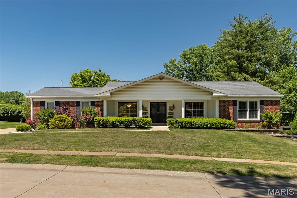 Your search is OVER!  Welcome to 329 Portico Ct in Chesterfield!  This beautifully maintained Parkway Central ranch has everything a family could want.  Step into the gleaming entry way that opens on both sides to LR and DR.  These rooms are open to kitchen and FR offering ease for entertaining but also offer some separation that families need for remote work/living balance.  Shining hardwood floors continue into the family room that has a gas fireplace and overlooks the back yard.  THE KITCHEN!  Beautiful maple cabinetry and stone countertops, stainless appliances, pantry, wall oven, breakfast nook, truly the heart of the home!  The Primary bedroom is spacious and serene, with an ensuite bath that boasts a walk-in shower, beautiful tile and euro-height vanity.  Three additional bedrooms and generous hall bath complete the main floor.    The LL is a recreation room dream...wood grain tile flooring, a gas fireplace and a full bath and w/out.  The yard has a park-like setting w/beautiful landscaping features and room for playsets!  It's the WHOLE PACKAGE!