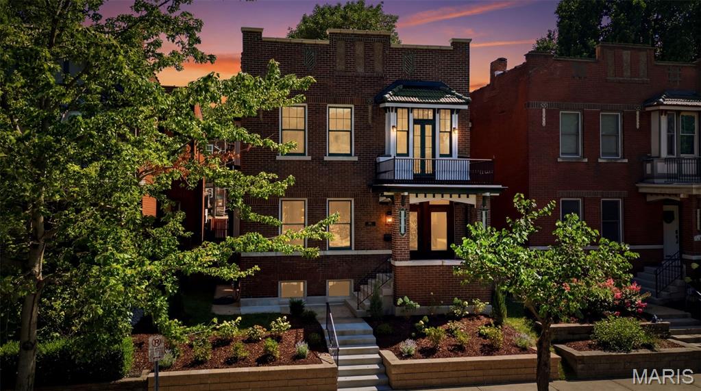 City living at its finest! You will fall in love with this re-imagined gorgeous home in the desirable Shaw neighborhood steps away from MOBOT, 1 block off Tower Grove Park, dining and more! As you walk up to the covered porch you will notice the historic brick, tile and beautiful front doors inviting you in for a long stay. Step inside and find a spacious, light filled living room with beautiful new oak hardwood floors throughout and a decorative fireplace that leads into an equally charming dining room perfect for hosting friends and family. The kitchen is modern and open with quartz countertops, stainless appliances, dry bar and an amazing covered deck off the kitchen. A moody 1/2 bath completes the first floor. Head upstairs and you will find 4 bedrooms, 3 of them large and spacious, the other one perfect for a nursery or home office and a second full bath. Lots of space to spread out and make your own. The upstairs has new windows in the rear, laundry on the 2nd floor and a large deck off the primary. There is plenty of living space in the basement, perfect for a game room, parties or just a hang out with family and friends. Head outside to the backyard and find a charming fully fenced green space/deck perfect for furry friends, kiddos, BBQ's, and a 2 car 3 sided carport for off street parking/covered parties. Everything has been touched. New TPO roof. Don’t miss out! It won't last long.