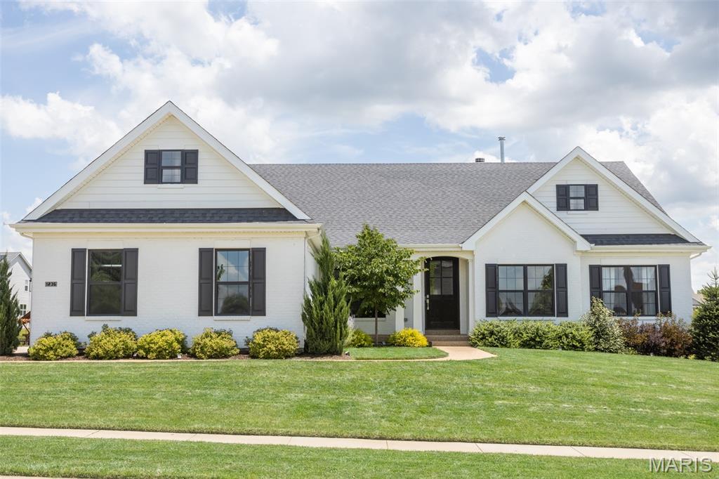 Fabulous custom ranch with 4,000sf of livable space in Fienup Farms-- STL's premier community. This like-new 4 bedroom and 4.5 bath home boasts an in-ground salt water swimming pool, 3 car side entry garage with EV charger, irrigation system, 9' foundation pour, 9' first floor ceilings featuring vaulted and coffered ceilings, covered deck with fireplace, custom cabinetry, Wolf/Sub-Zero appliances, quartz countertops, extensive trim work, wood floors, wet bar, great room fireplace and finished lower level.