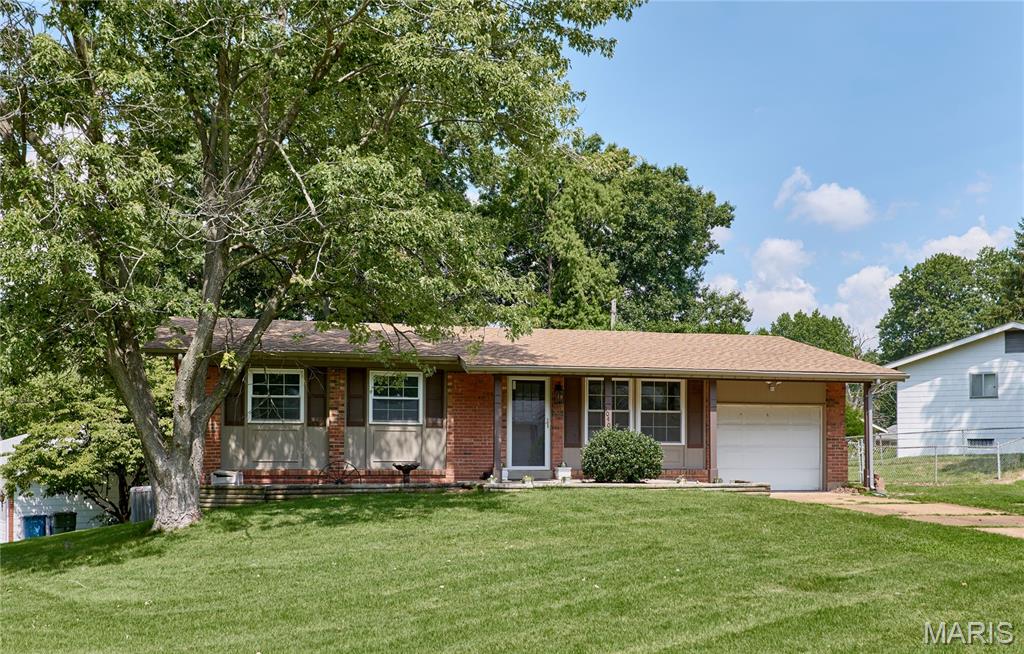 Welcome home! This beautifully updated brick ranch is ready to write its next chapter with you. A new roof offers peace of mind from day one, and the updates carry right on through — from the light-filled living room with rich wood-look flooring to the completely new kitchen, where crisp white shaker cabinets, quartz counters, and stainless appliances make everyday cooking feel like a treat. The adjacent dining space is perfect for morning coffee or hosting family dinners.

Down the hall, comfortable bedrooms offer flexible space for family, guests, or a home office, alongside a stylish updated half bath with a bold statement wall and a fully renovated full bath featuring a new vanity, modern fixtures, and fresh tile. The mostly finished lower level adds a spacious bonus living area — ideal for a rec room, home gym, or media space — plus great storage.

Set on a generous, tree-shaded lot with mature landscaping and a 1-car garage, this home is warm, welcoming, and truly turn-key. Come see why 10403 St Ives is ready for you to make it your own!