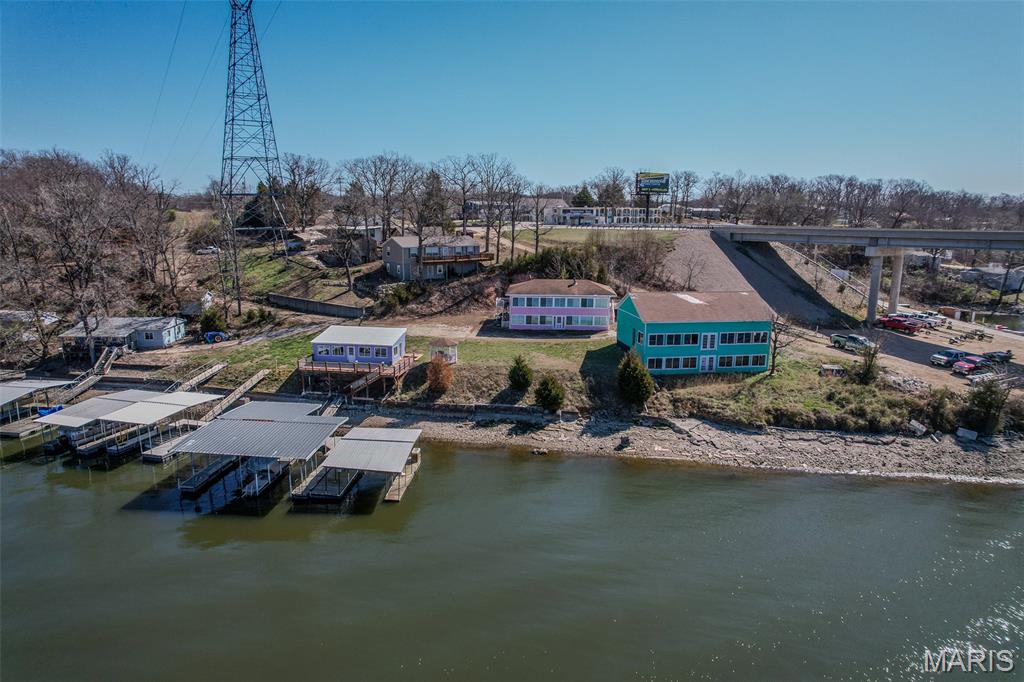 8 Lots with a total of 6.408 Acres of Land! This is Lake Front Property with 4 boat slips (633' lake front) being sold "as is" and multiple structures (3,204 total sq foot) being sold "as is" and currently zoned residential. There is so much potential with this property located at the Hurricane Deck Bridge! Property for sale includes: 072009000030009011000, 07200900030006011000, 07501600000007004001, 07501600000007002000, 07501600000007012000, 07501600000007003000, 07501600000007004000, 07501600000007007000