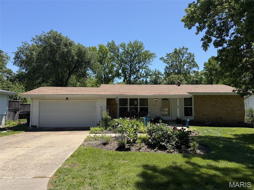 Tucked into the highly sought-after Parkway School District, this spacious ranch offers the perfect blend of comfort, functionality, and convenience. Natural light pours into the beautiful room addition just off the kitchen, creating an inviting space ideal for relaxing, entertaining, or everyday living. The main level features 3 bedrooms and 2 full baths, while the finished walkout lower level adds even more flexibility with a 4th bedroom, full bath, and additional living space perfect for guests or a home office. Step outside to enjoy the covered patio overlooking a backyard that truly feels like a gardener’s paradise—perfect for morning coffee, evening gatherings, or simply enjoying the peaceful outdoor setting. Major updates including a newer roof, HVAC system, and hot water heater provide peace of mind. Enjoy easy access to highways, shopping, dining, and entertainment—all in a location that keeps you connected to everything West County has to offer.
