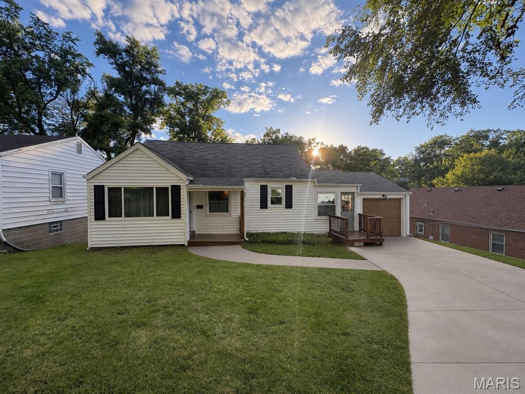 Check out this adorable home that been renovated from top to bottom. New concrete driveway and front walk are scheduled to be poured but delayed with all the rain.