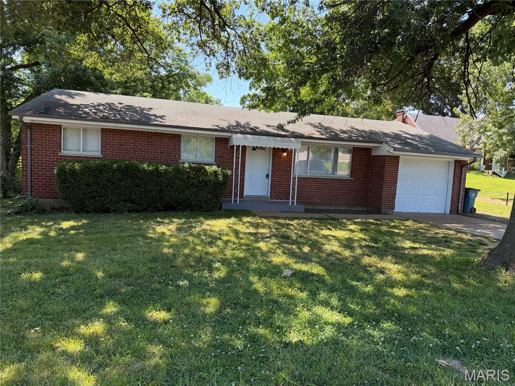 Wow, you will love this beautifully renovated Ranch home, that just sparkles with 3 bedrooms on the main floor and 1 bedroom/office on the walk out lower level. Open & bright floor plan. Wood floors throughout the Living room, kitchen/dining room and all 3 bedrooms. Newly painted throughout the entire main & lower-level floor. Kitchen/breakfast room is up lifted with all new white cabinets, granite countertops, new stainless steel appliances. Luxury laminate plank floors. Main floor bathroom is fully renovated. MORE updates and features include ALL NEW exterior doors, interior doors, wood flooring on the main level and carpeting on the lower level. New electrical fixtures and plumbing fixtures. Walk out Lower Level features a large family/rec room, with one additional bedroom / office with newly built full bathroom.  Plenty of storage in lower level of this home. One car garage with with attic space with steps to access. A large patio off of the kitchen overlooks the private and level backyard with mature trees that is just perfect for outdoor entertainment. Roof is about 10 years old and has been inspected. HVAC and Water Heater are in great condition. A home warranty may be offered. Great curb appeal. Located in the great Hazelwood area. Accessible to major highways and shopping. A must see.