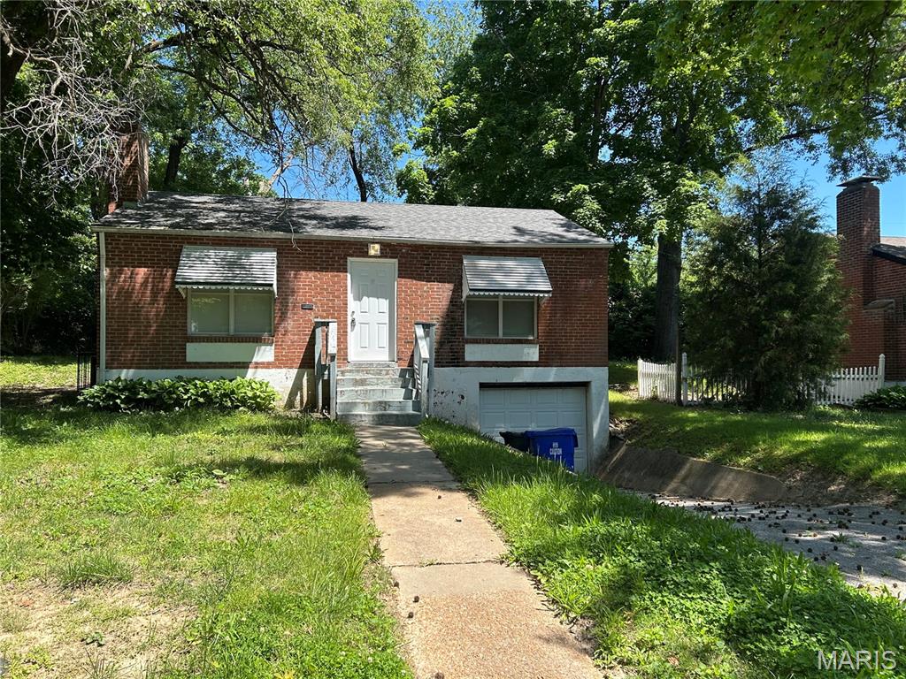 Nice 2 bedroom and 1 bath single family house for lease.  All brick property with all natural colors newer plank floorings, newer HVAC and hot water heater.  Freshly painted.  Nice fence yard with gate. Entire house has been updated including newer windows and electrical panel. Extra space in basement perfect for additional storage or a movie theatre, with a tuck-under garage!  Come check it out as it won’t last long.  Rent included trash pick up by University City and up to $75 MSD sewer.  Please note landlord is looking for applicant that has at least 625 credit score. Credit and background check is required and it is $65 per applicant.  Closed proximity with the recent development on 170/Olive such as Costco, and other restaurants etc.