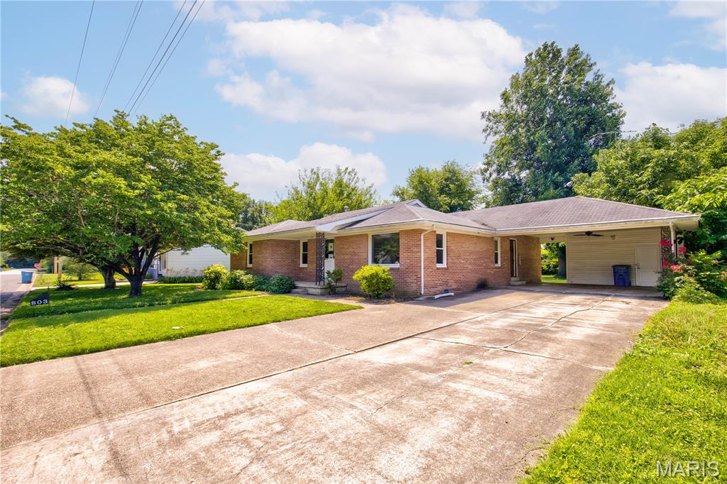 The perfect starter home just hit the market!!! This beautiful 3 bedroom 2 bath home has tons of space and a great layout!!  This home is extremely inviting when you enter through the front door when you see the large windows and hardwood floors.  The home has a spacious kitchen, all appliances stay, and it leads into a huge family room!  The large family room has a big beautiful bay window and also built in shelving for tons of storage.  The 3 bedrooms are all large with the primary has double closets!  Both bathrooms contain vintage tile and are full baths!  The laundry is also very large with a lot of storage with built in cabinets.  You have an attached carport with a storage room, and large back yard to have family fun or entertaining in!  Schedule your tour today!!